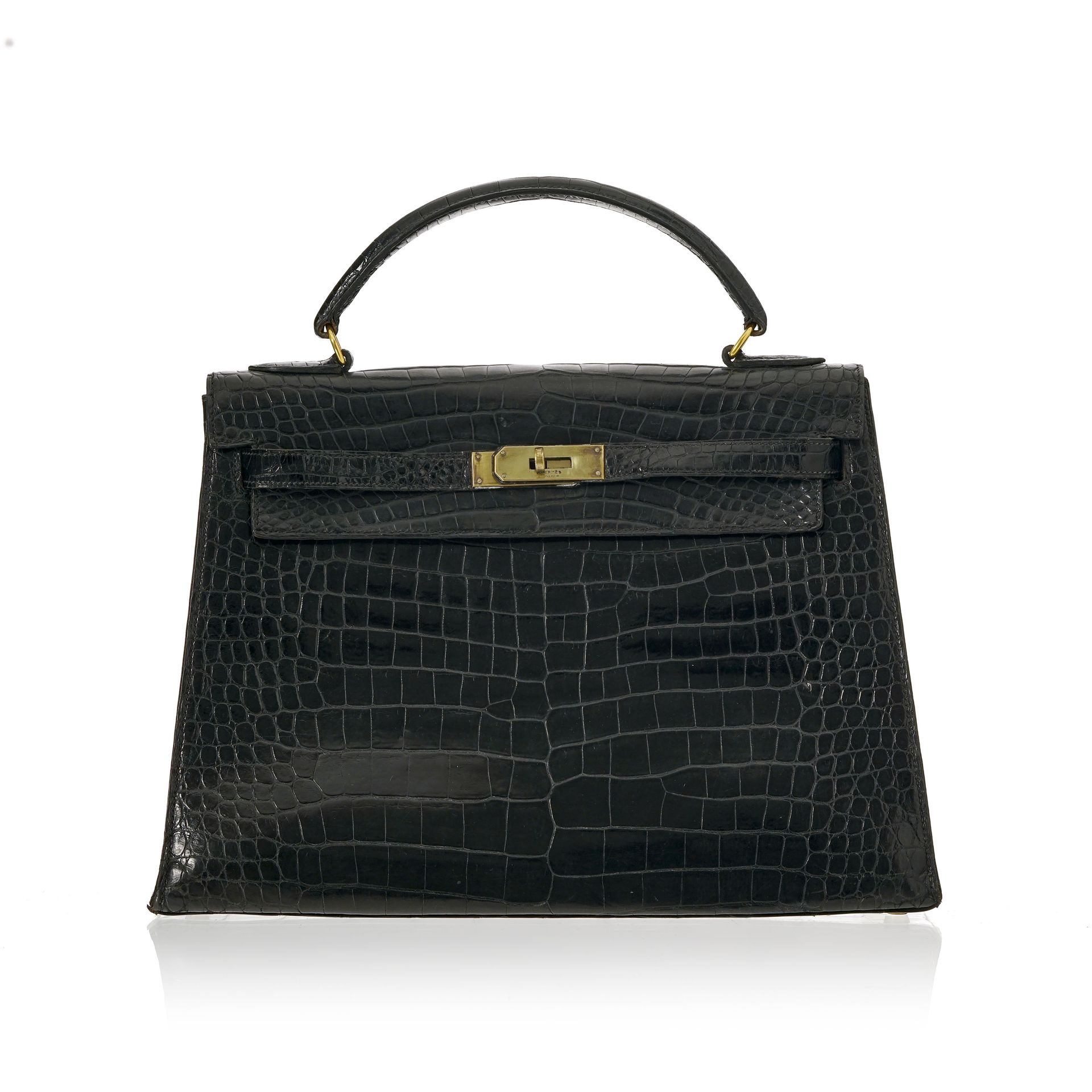 Null Hermès, sac Kelly 32 en crocodile porosus noir, circa 1970, bouclerie plaqu&hellip;