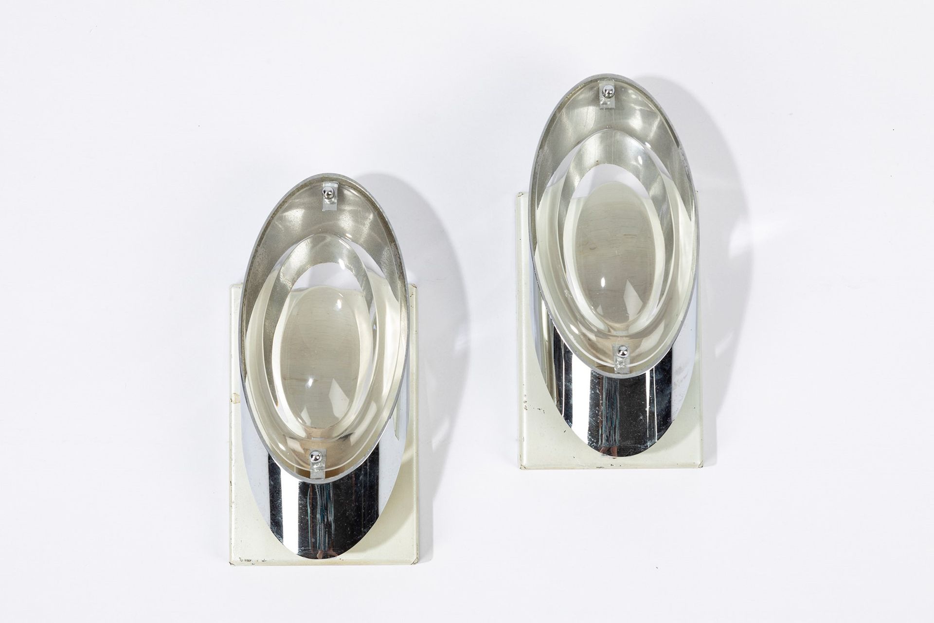 OSCAR TORLASCO Applique, 70's period

h cm 10,5 x 22 x 7
glazed chromed metal, f&hellip;