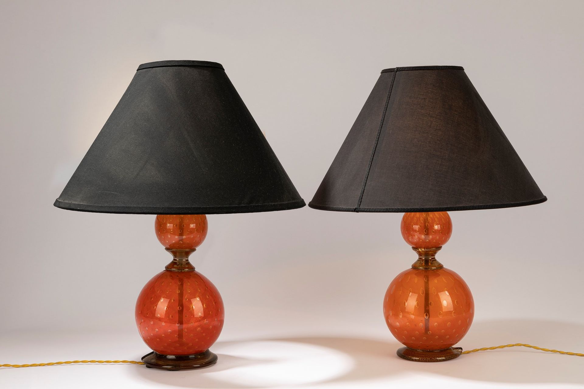 ITALIAN MANUFACTURE Pair of table lamps, 60's period

dm cm 46, H cm 55
orange b&hellip;