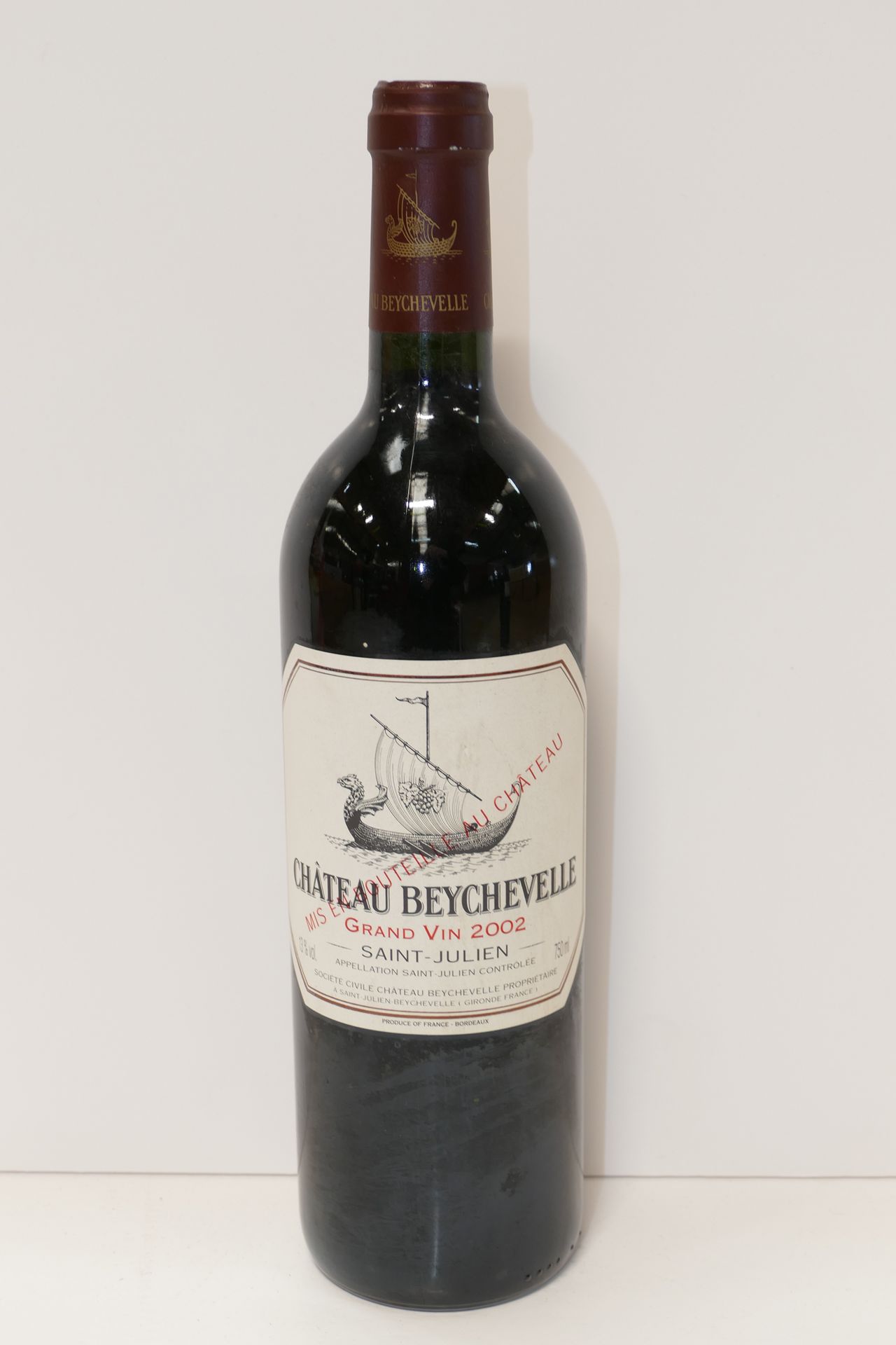 Null 1 Btle Château Beychevelle 2002 4th GCC Saint Julien slightly dirty label E&hellip;