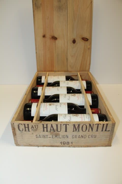 Null 6 Btles Château Haut Montil 1981 GC Saint Emilion标签严重粘连，略显脏污，其中两个非常轻微的损坏，装在&hellip;