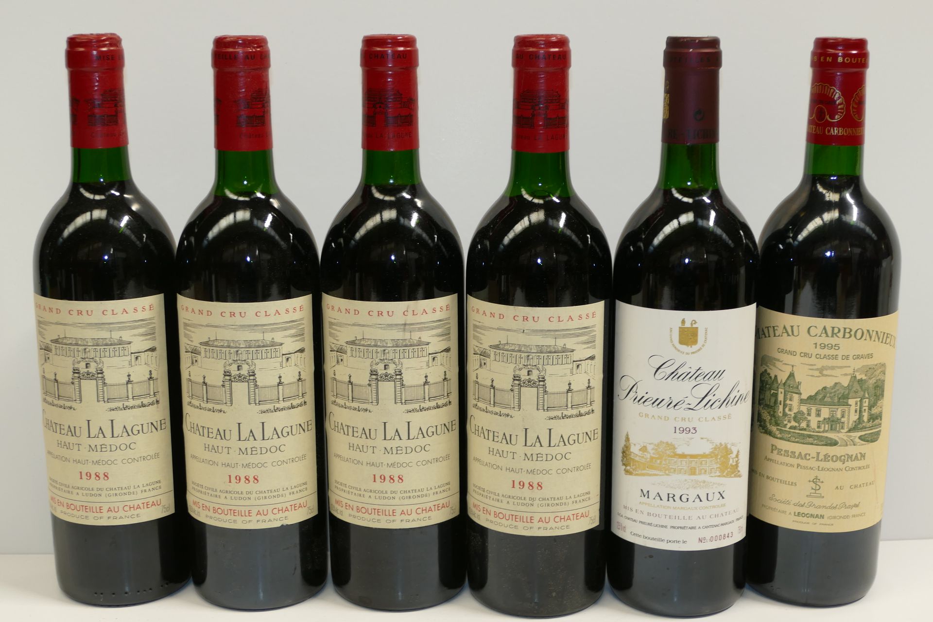 Null 一批6瓶：4瓶Chateau La Lagune 1988上梅多克三等奖，包括两瓶低度酒；1瓶Chateau Prieuré Lichine 1993&hellip;