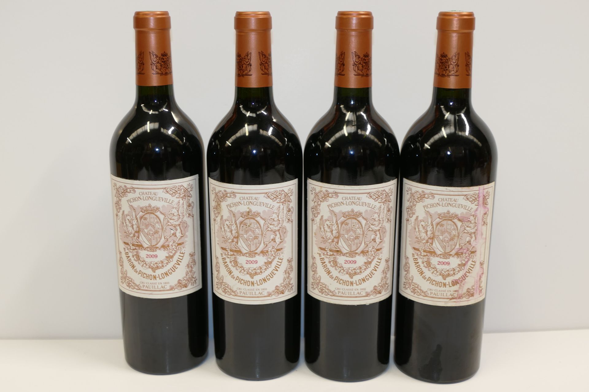 Null 4 Btles Château Pichon Baron 2009 2nd GCC Pauillac of which two labels slig&hellip;