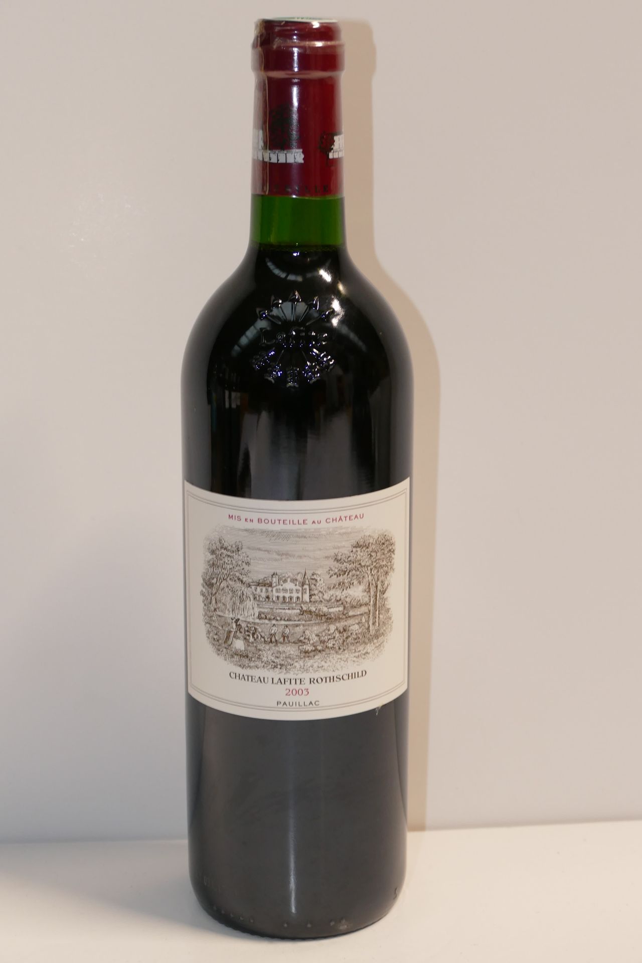 Null 1 Btle Château Lafite Rothschild 2003 1er GCC Pauillac provenant d’une cais&hellip;