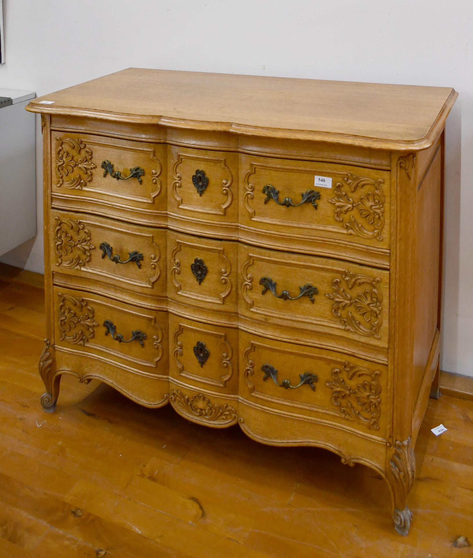 Null Small chest of drawers in light oak carved in the Louis XIV style, opening &hellip;