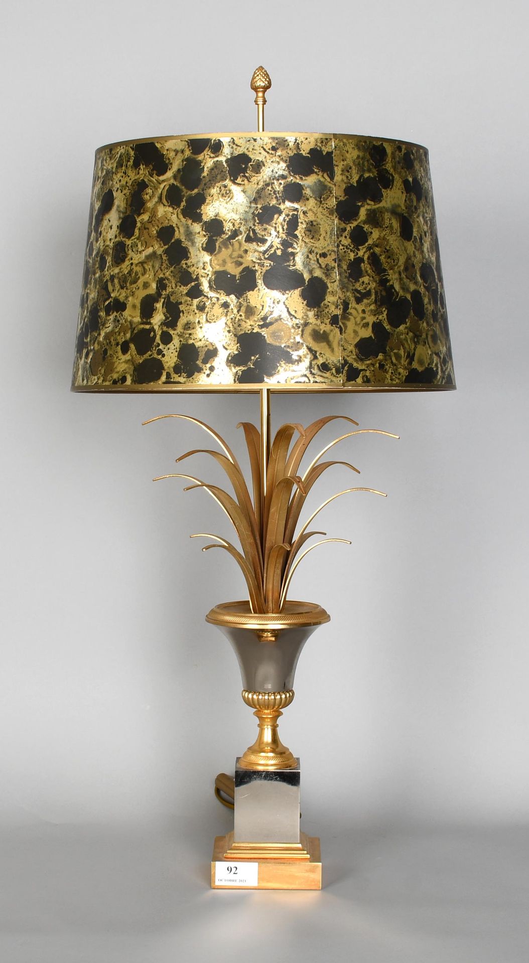 Null Maison Charles

Lampe “roseaux” dorée et chromée. Hauteur : 73 cm.