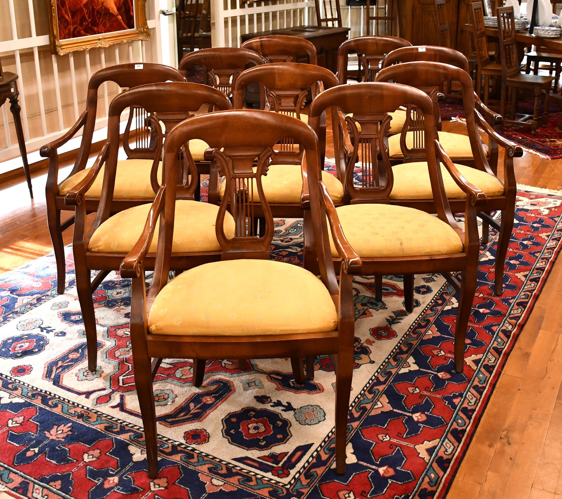 Null Set of ten Directoire style cherry wood armchairs with curved lyre backs
