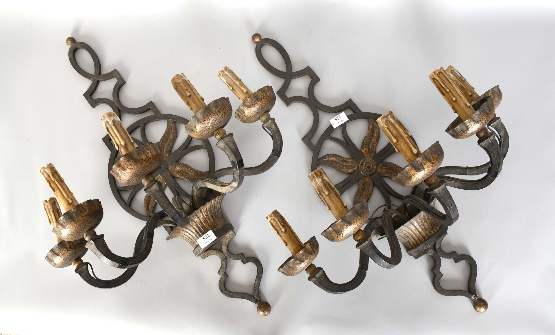 Null Pair of old sconces with five arms in patinated iron

Height : 80 cm.