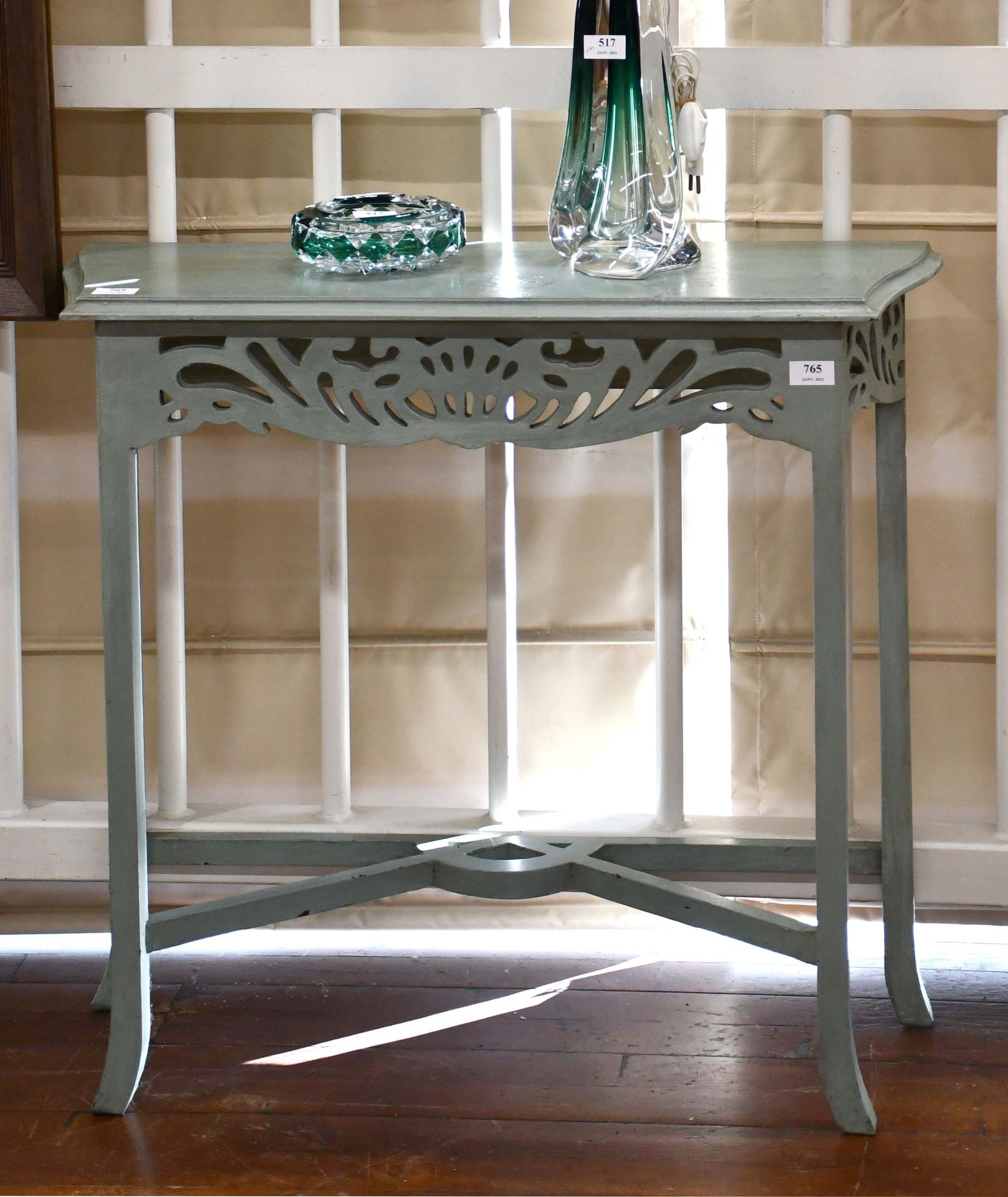 Null Small patinated console with openwork belt