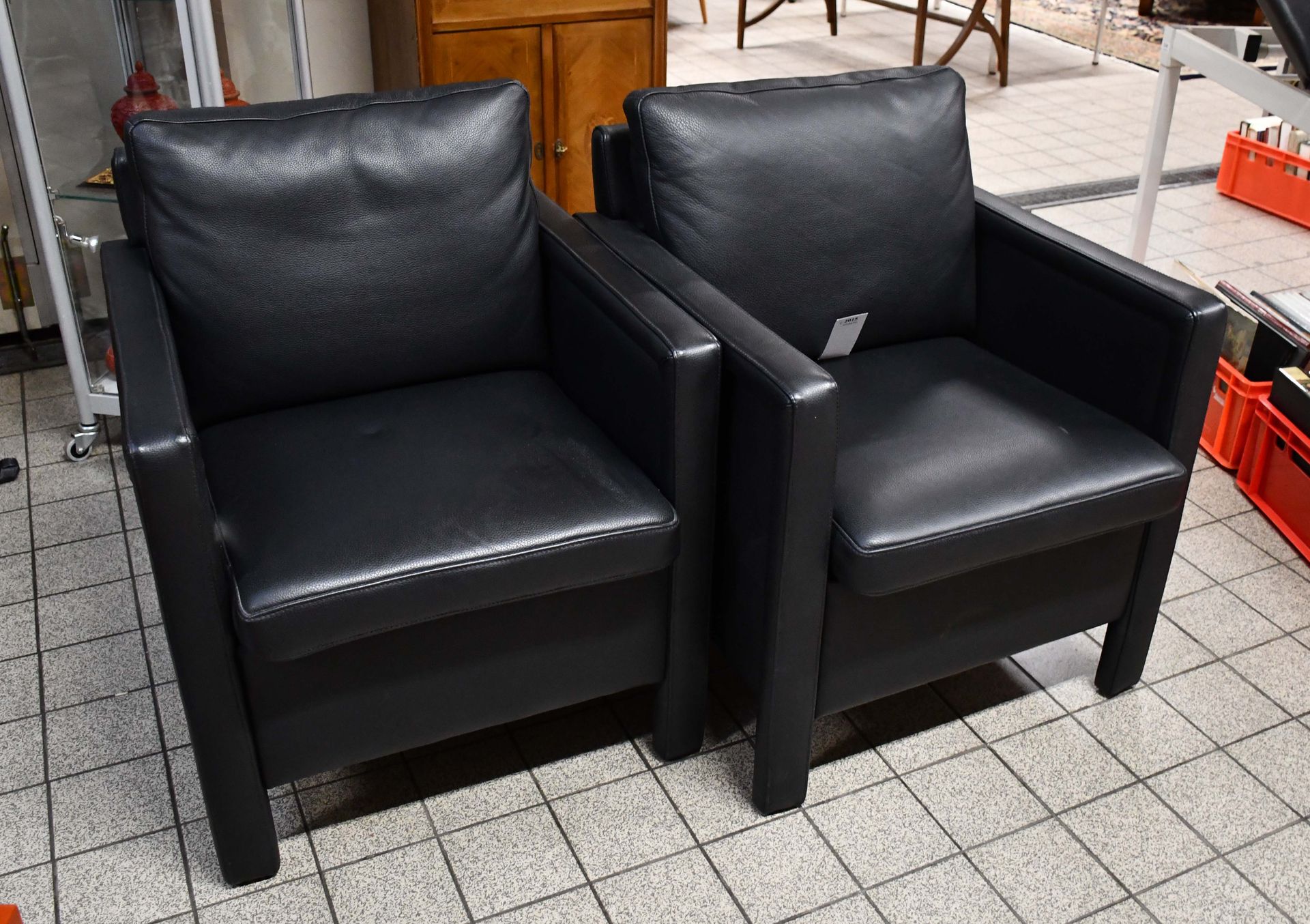 Null Pair of black leather club chairs