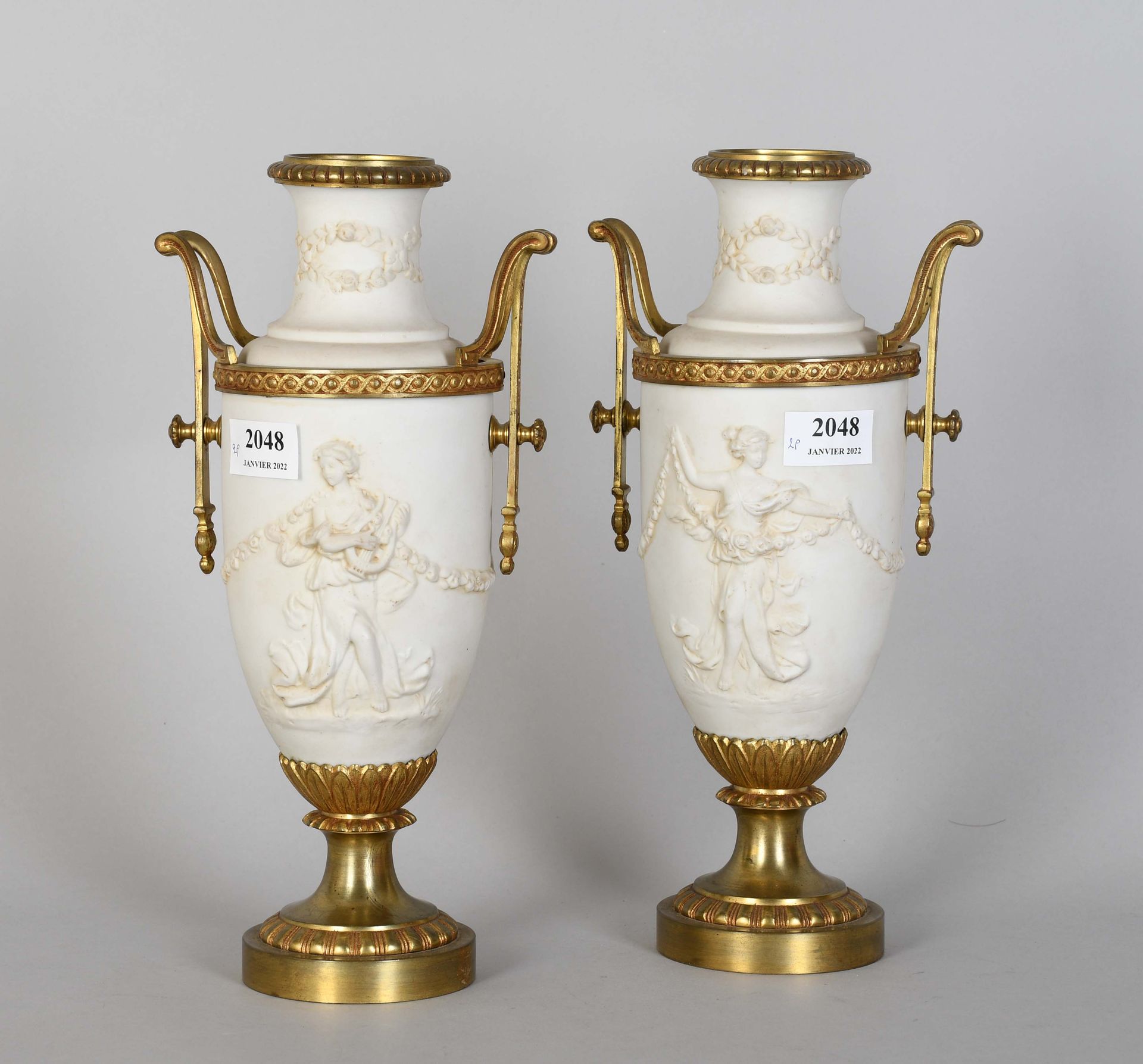 Null Pair of cookie cassolettes decorated in relief with draped ladies and garla&hellip;