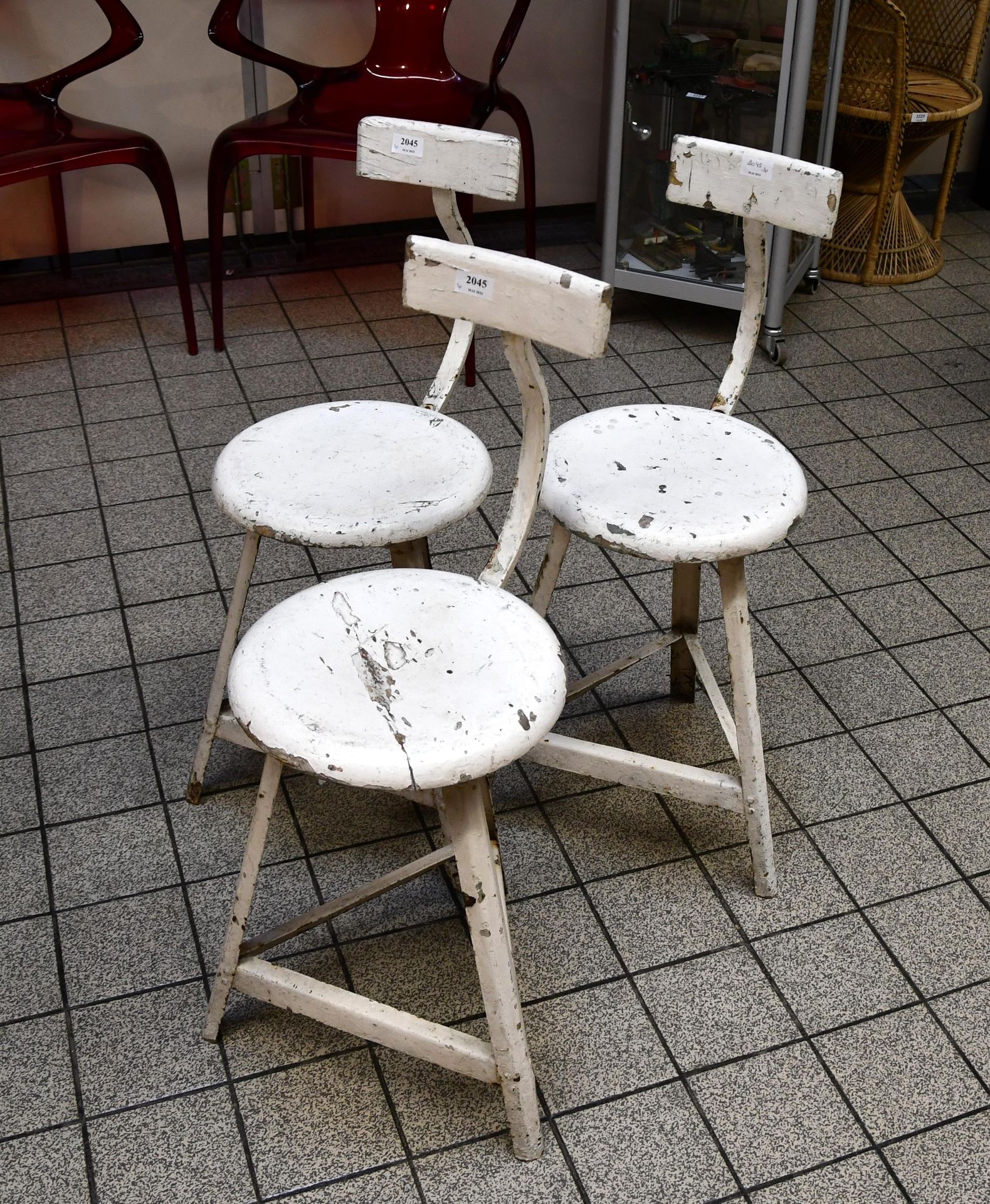 Null Set of three old industrial tripod stools, with backrest