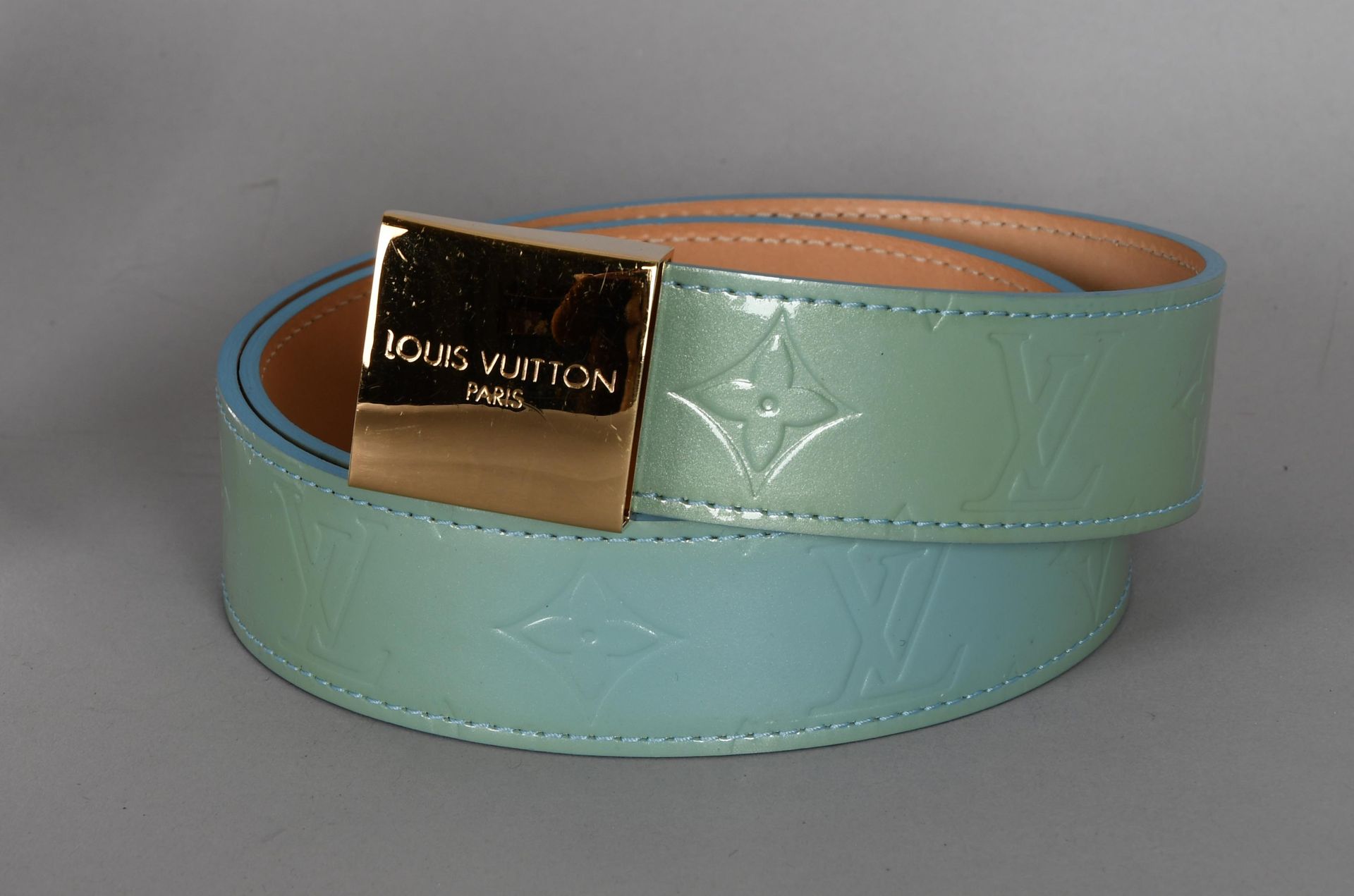 Louis Vuitton Turquoise patent leather belt. Gold buckle…