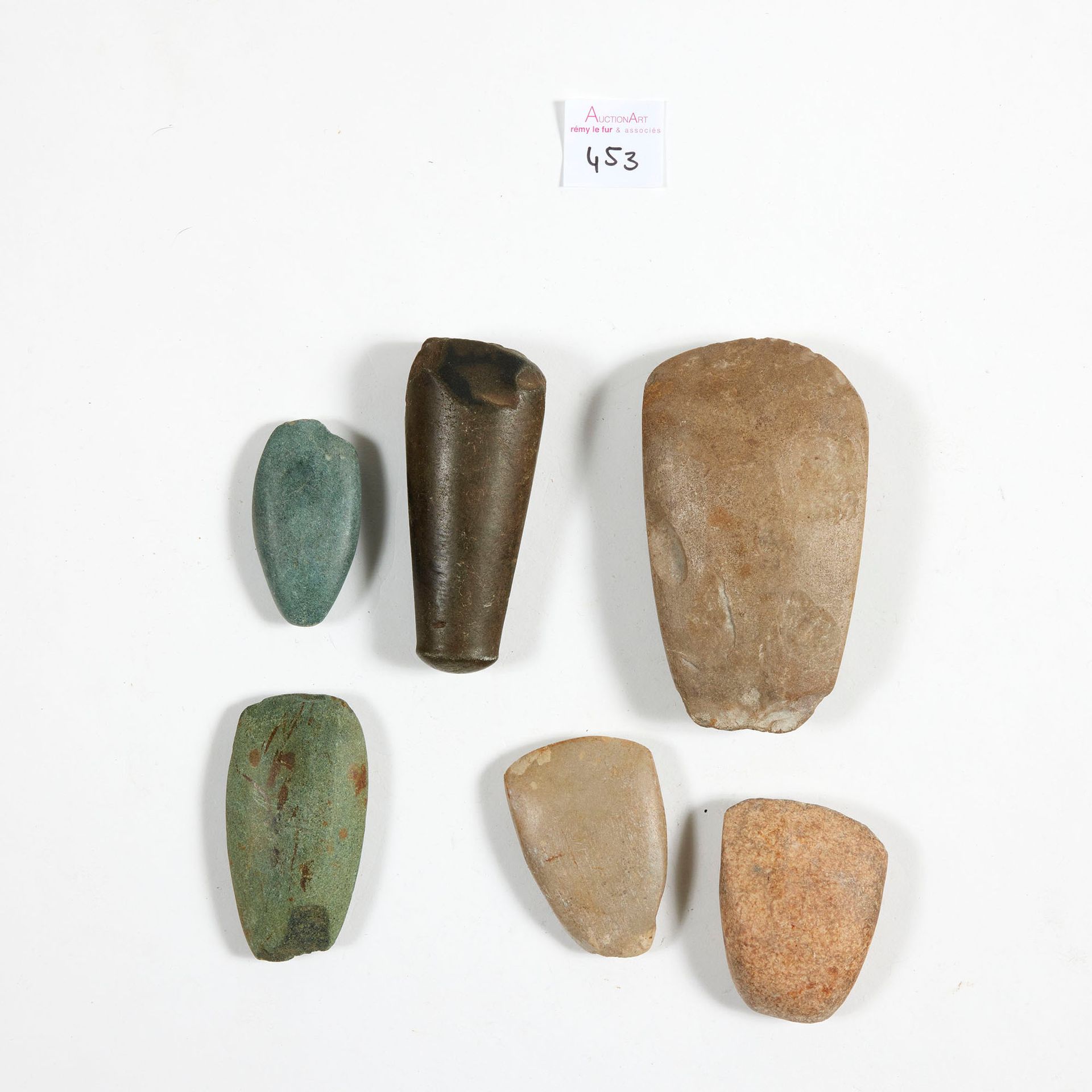 LOT Lot 

including a fragment of a button axe and five polished axes.

Greensto&hellip;