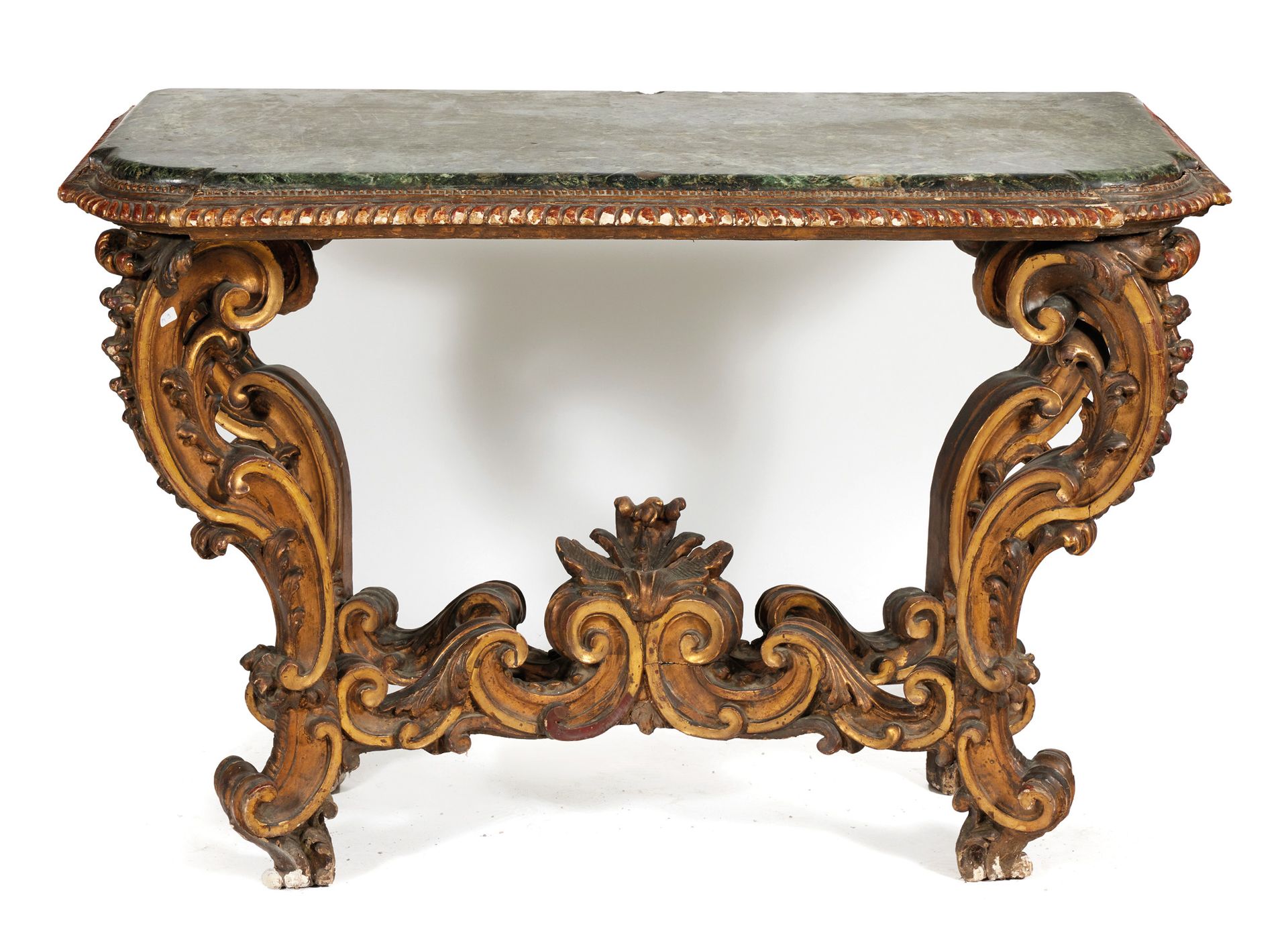 Large console Large console

in gilded wood, molded and carved with four feet wi&hellip;