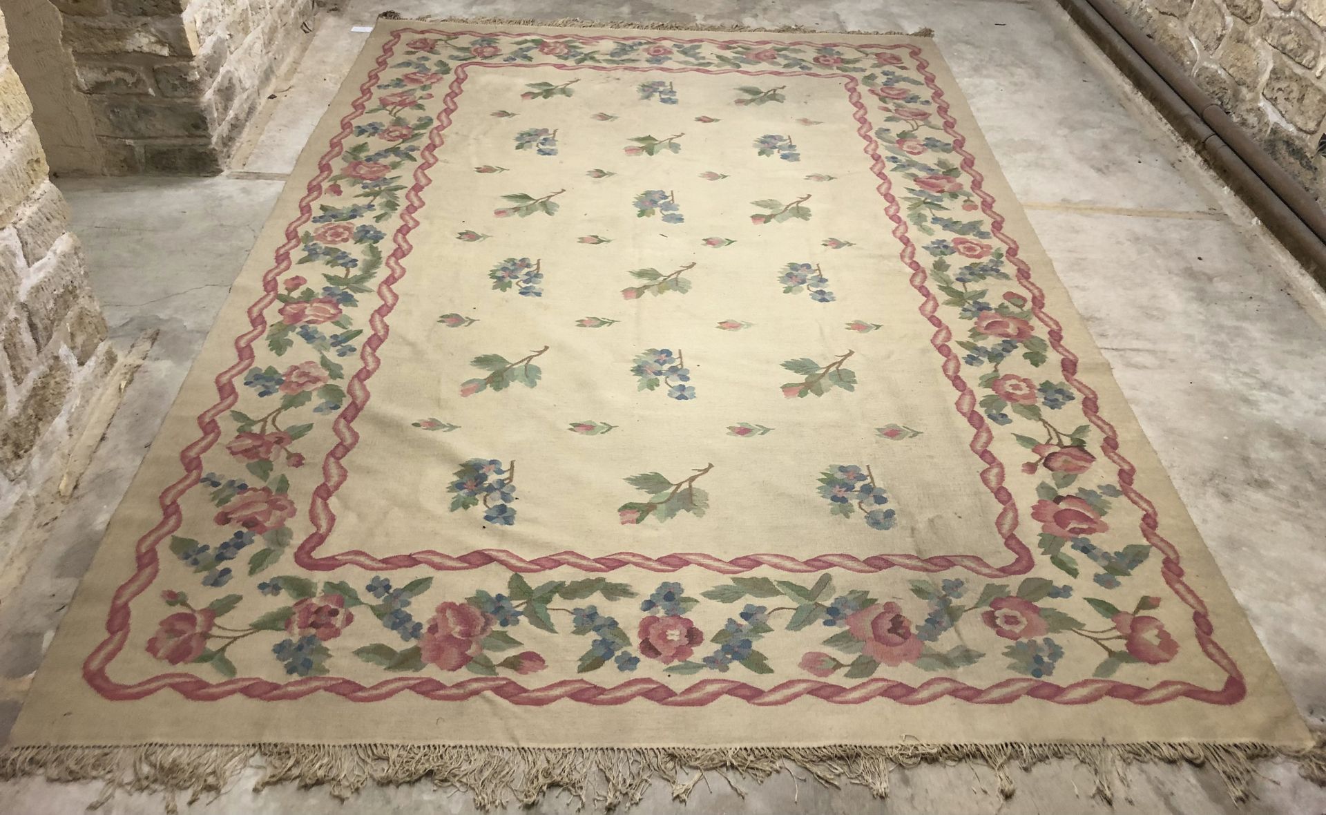 Null Wool carpet with a cream background decorated with flowers, the border with&hellip;