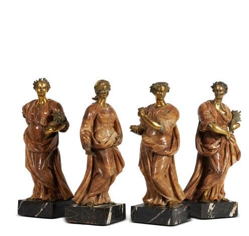 Null * 罕见的四件套雕塑

意大利新古典主义学校，罗马，约1780年。

东方玛瑙、鎏金青铜和带灰色纹路的黑色大理石为代表。

为基地。

高度从60.5&hellip;