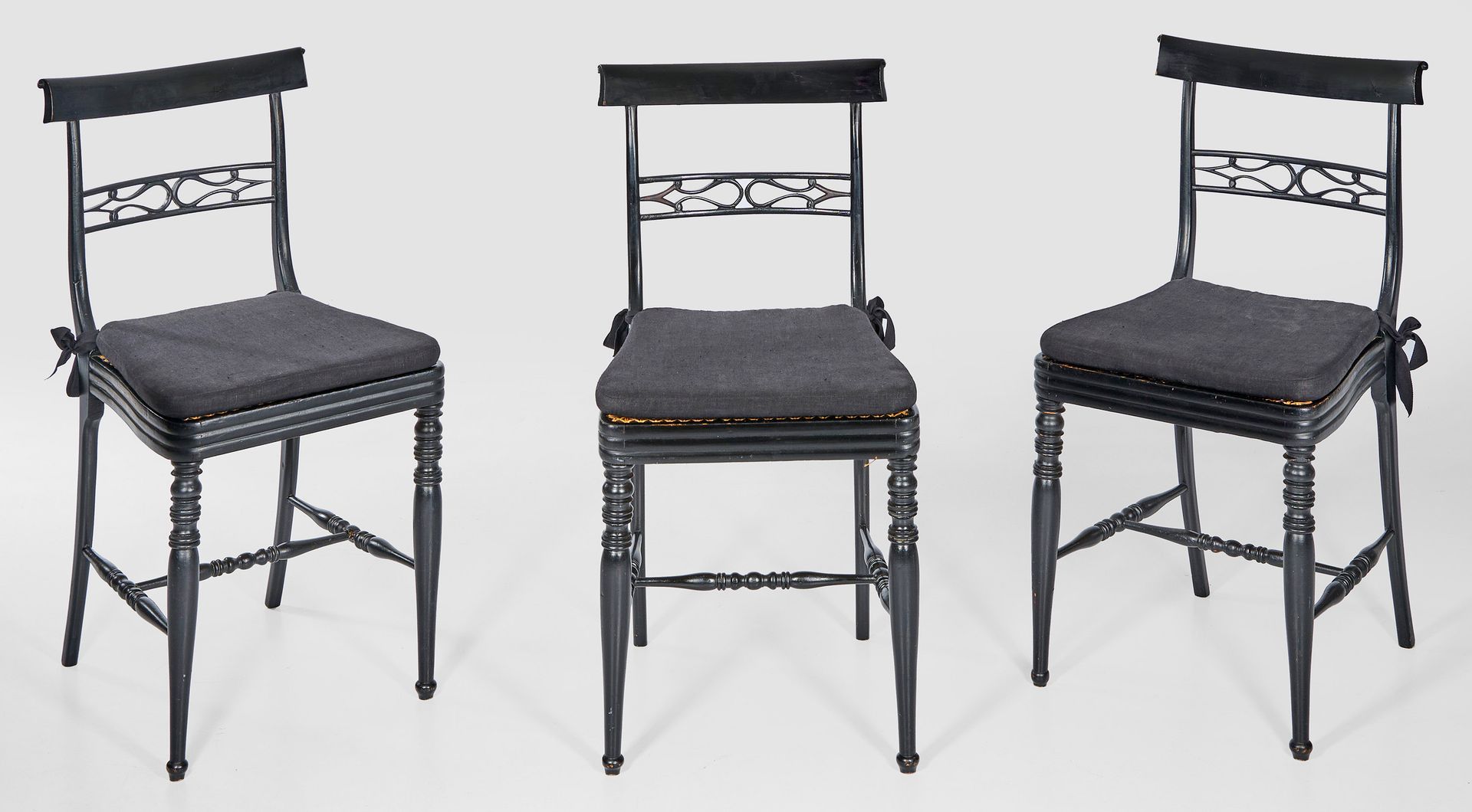 Null Three wooden salon chairs, painted black. Cambered, all-round gadrooned fra&hellip;