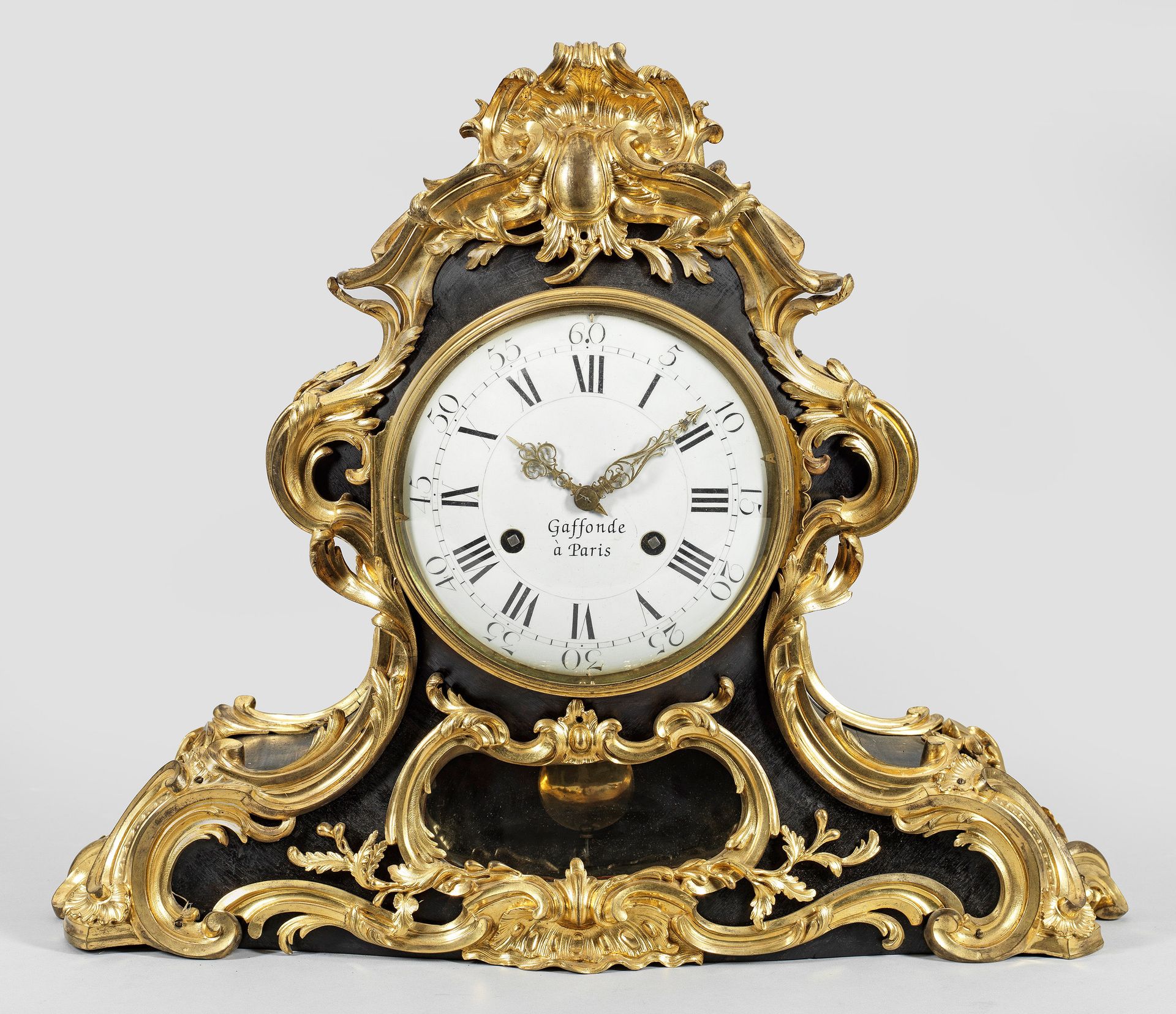 Null Large, representative Louis XV wooden pendulum, ebonized and rich applicati&hellip;