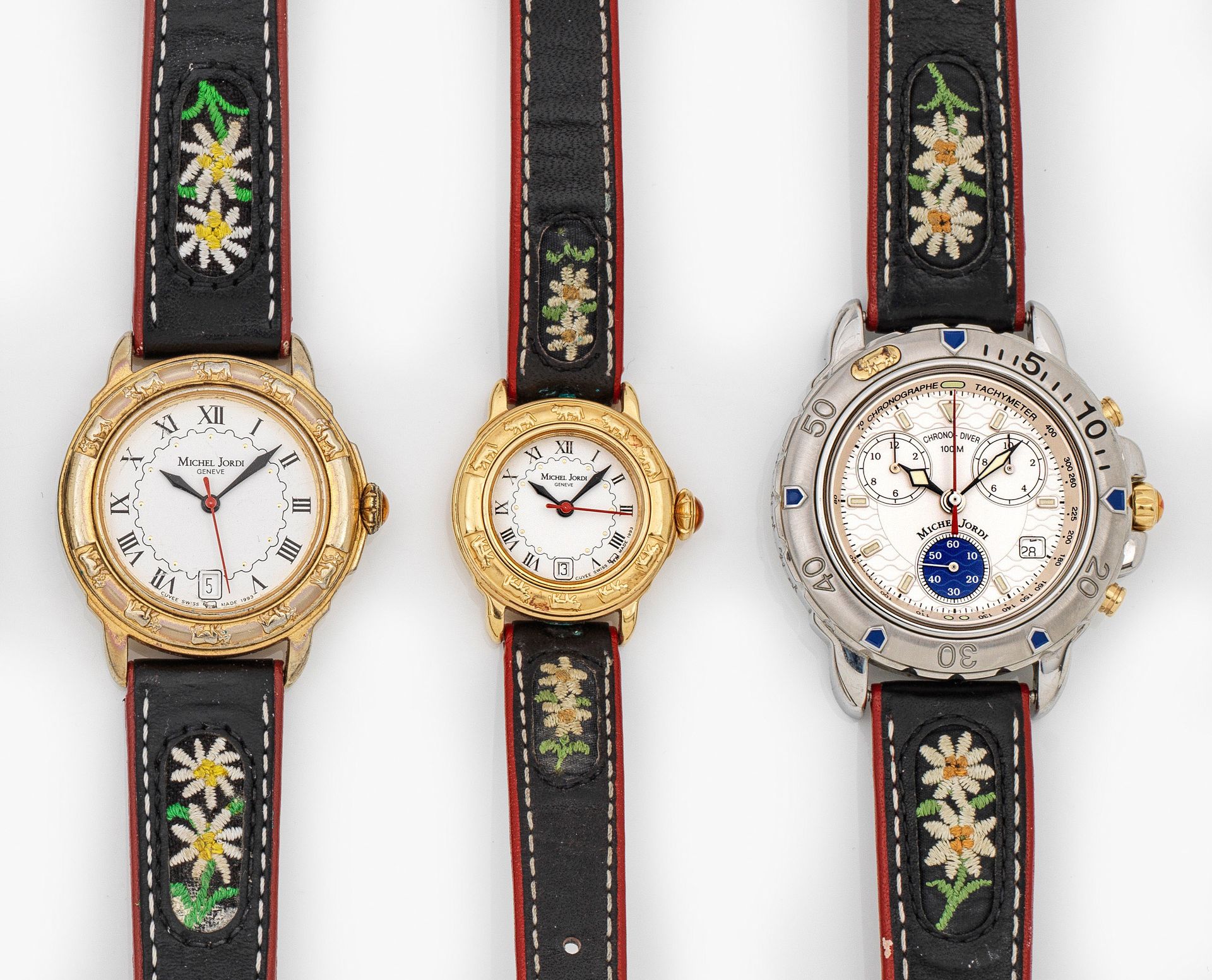 Null 米歇尔-约尔迪（Michel Jordi）的三款腕表，日内瓦，1991 年 精钢，镀金。圆形模制表壳，白色表盘，黑色罗马数字和矛形指针，日期显示。皮革&hellip;