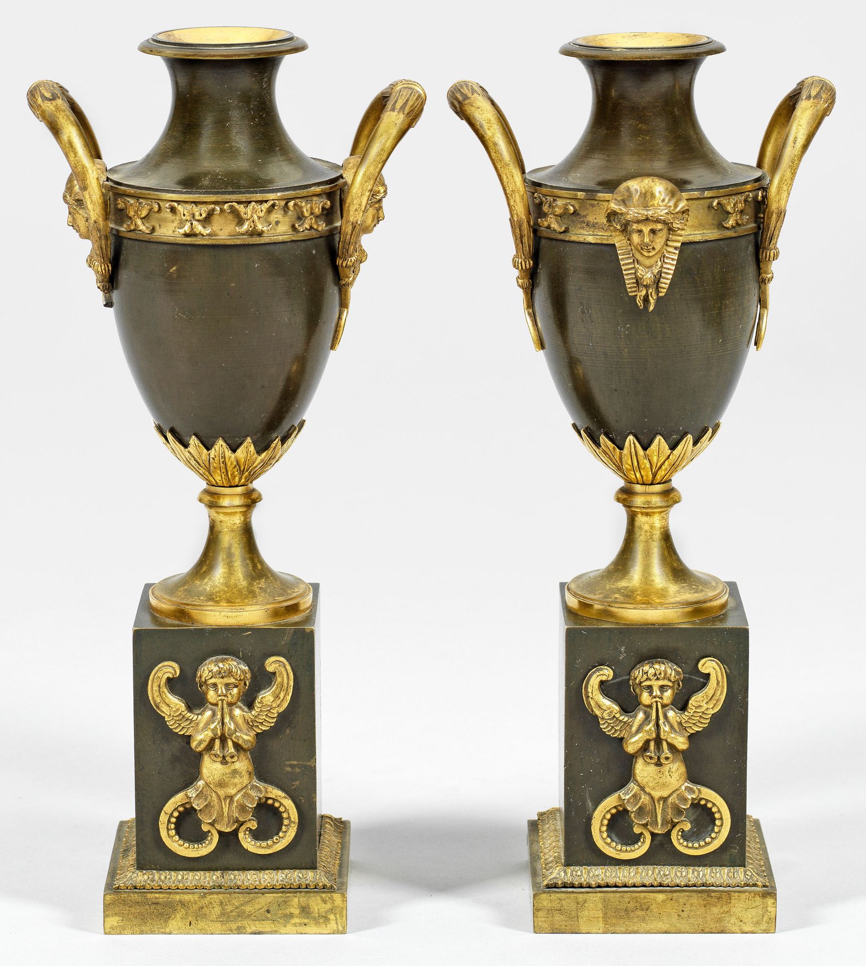 Null Pair of Empire decorative bronze vases, dark patinated and partially gilded&hellip;