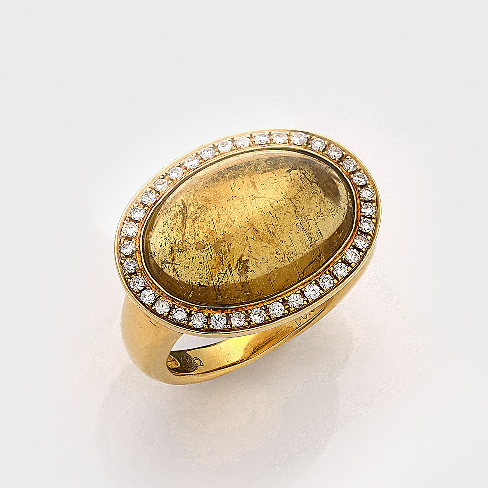 Null Bague décorative en or jaune, ciselée en 750. Sertie au centre d'un quartz &hellip;