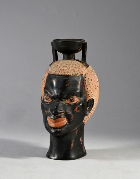 Null Vase à tête de Nubien, terre cuite à décor polychrome.
Style étrusque.
H.: &hellip;