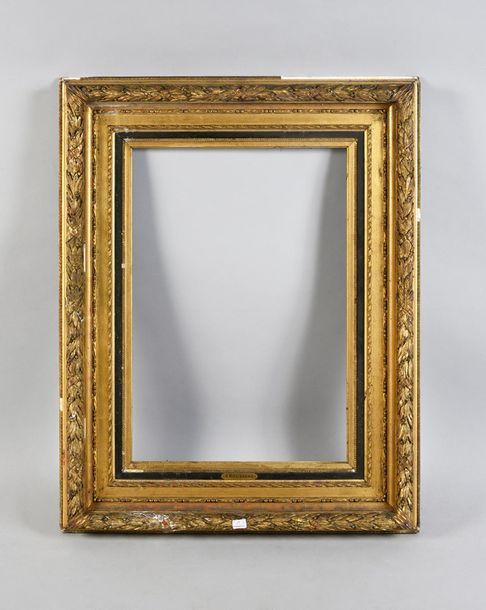 Null Wooden frame with gilded and blackened stucco decorated with friezes of rib&hellip;