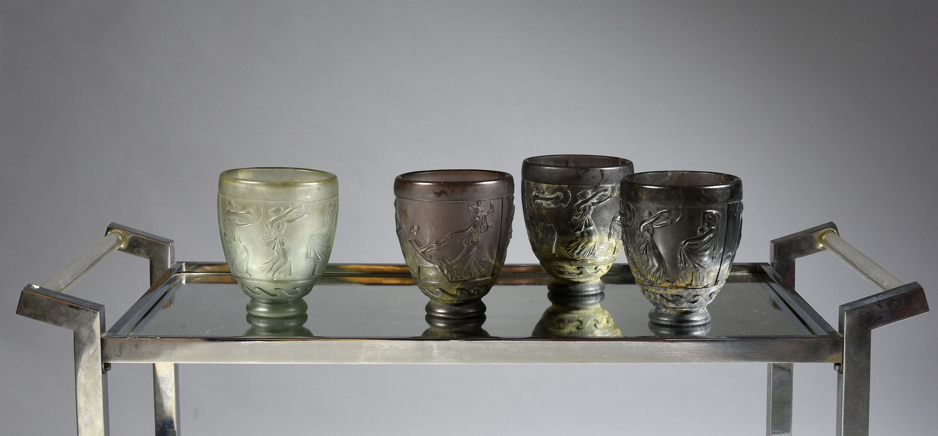 Georges de FEURE (1868 - 1943) 
Suite de 4 vases en verre moulé pressé satiné, à&hellip;