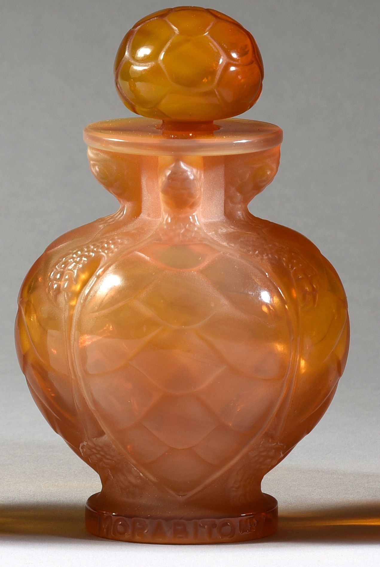 Morabito - «N°7» - (1951). 
A tinted crystal bottle "tortoise shell" pressed cyl&hellip;