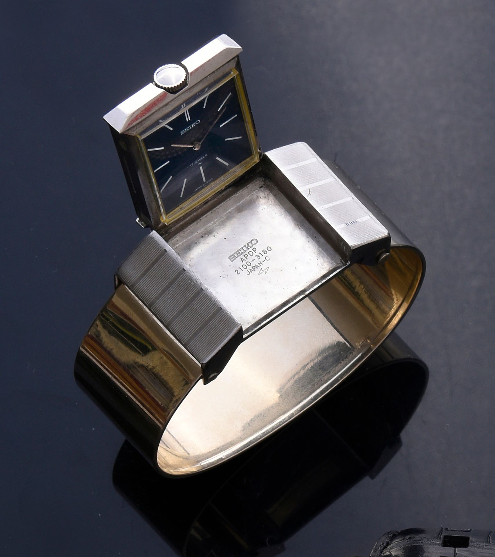 Rare belt buckle watch for golfer model Seiko APDP 2100-3180 in steel  opening with shutter. Mechanical winding. Strap in white gold 750e signed  DINH VAN (special order) Gross weight : 78 g