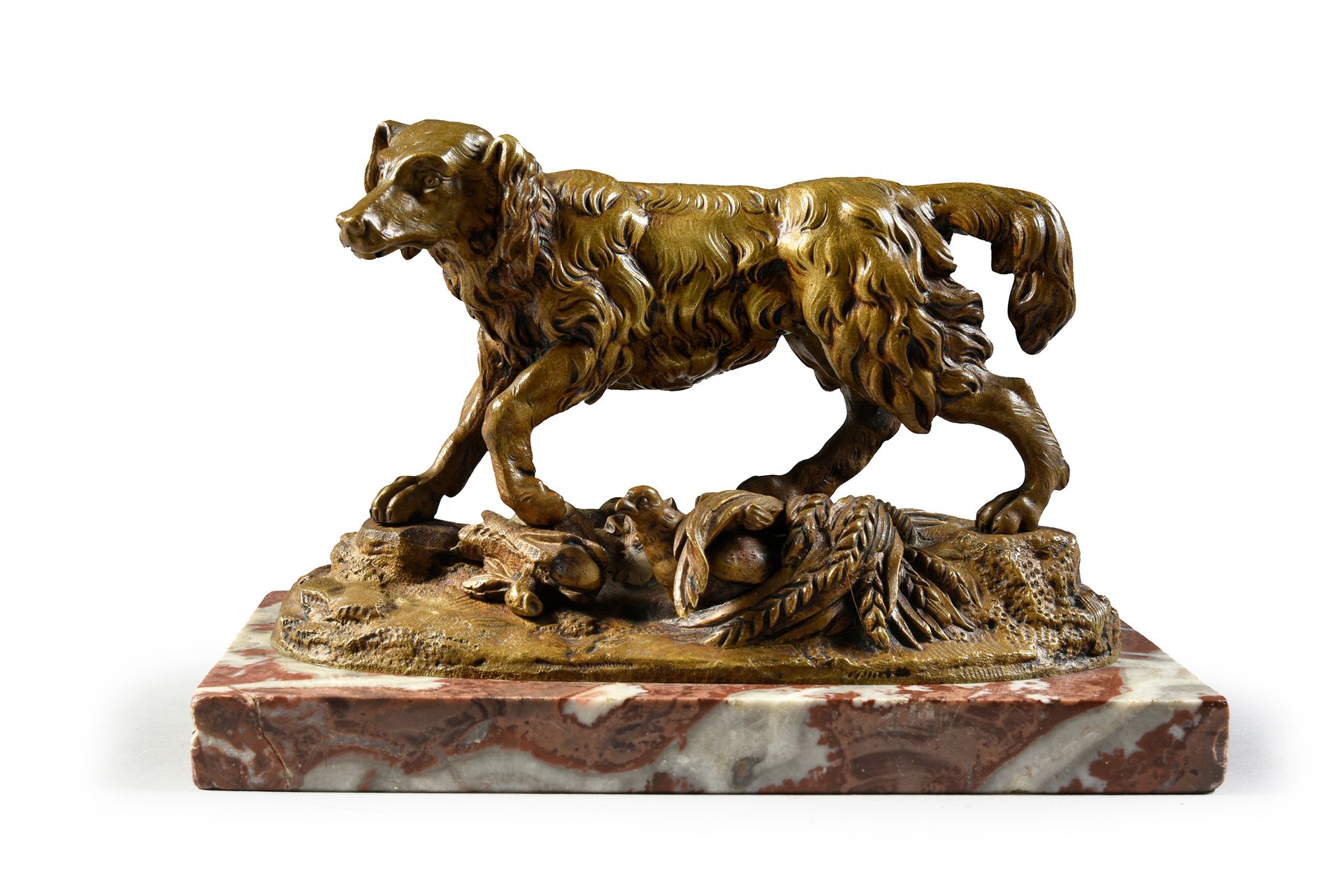 Ecole du XIXe siècle. Spaniel with a partridge.
Bronze on a red marble base.
H.:&hellip;