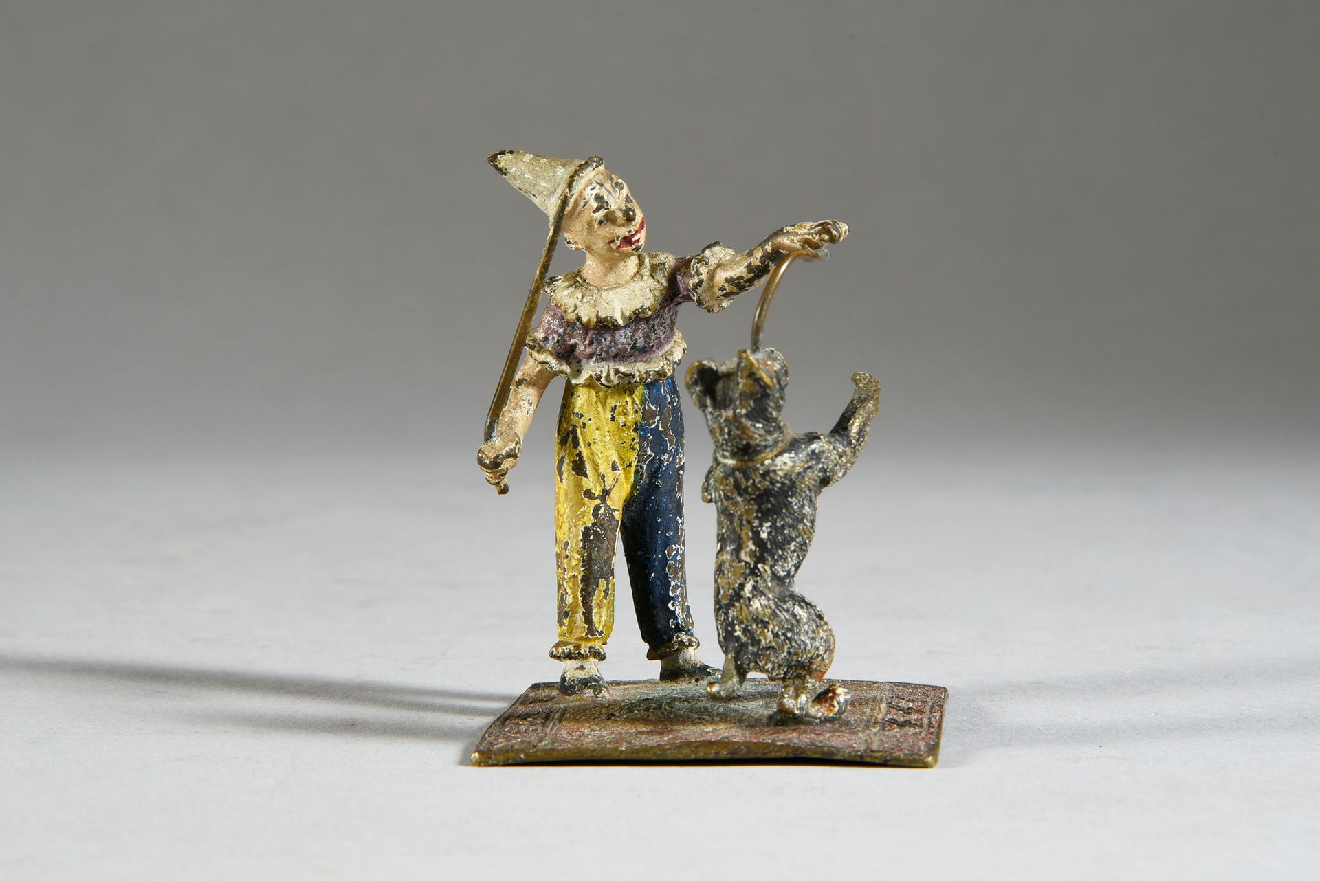Null Payaso de bronce de Viena con perro.
