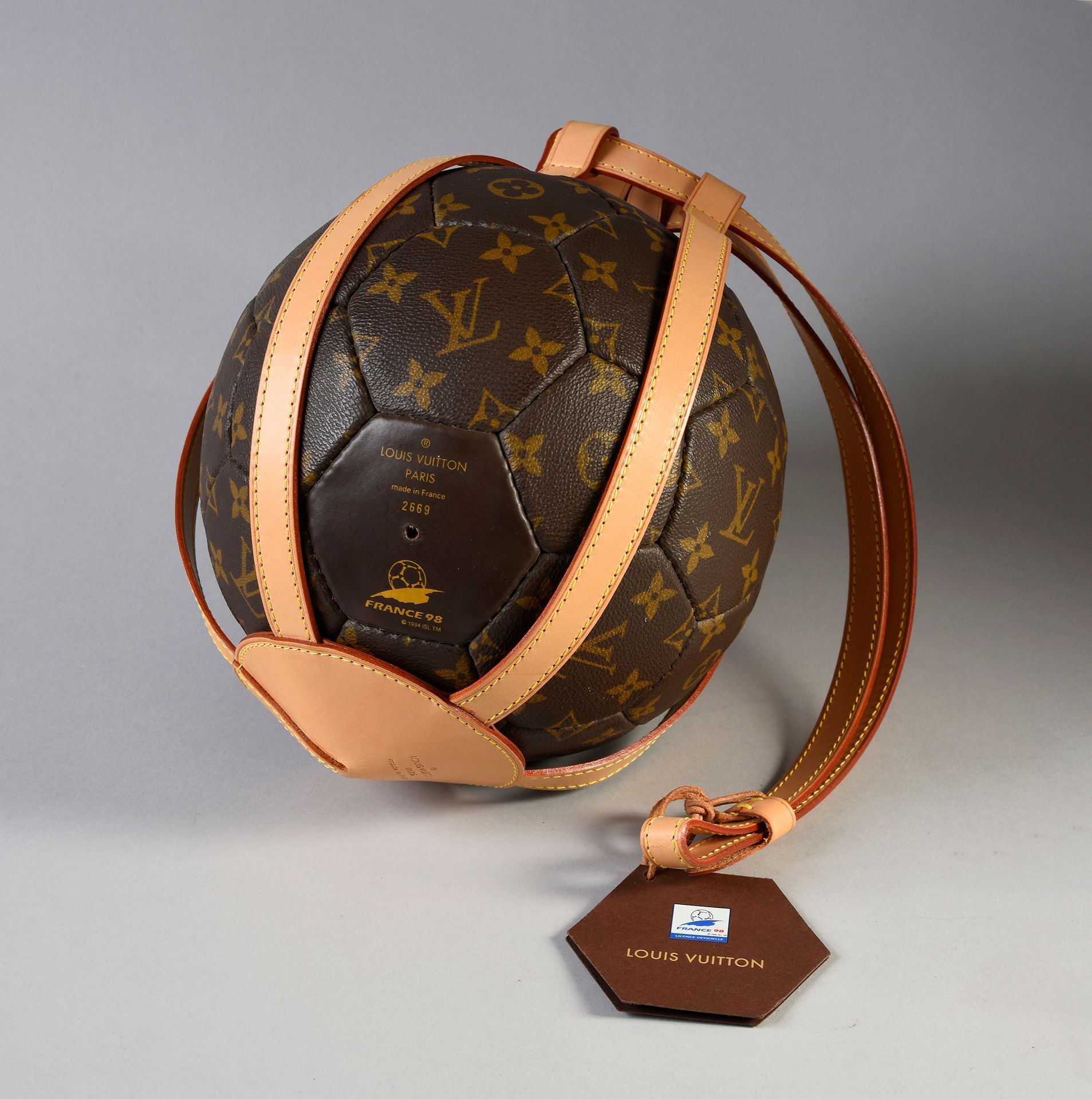 Louis Vuitton. Ball in coated canvas with monogram beari…