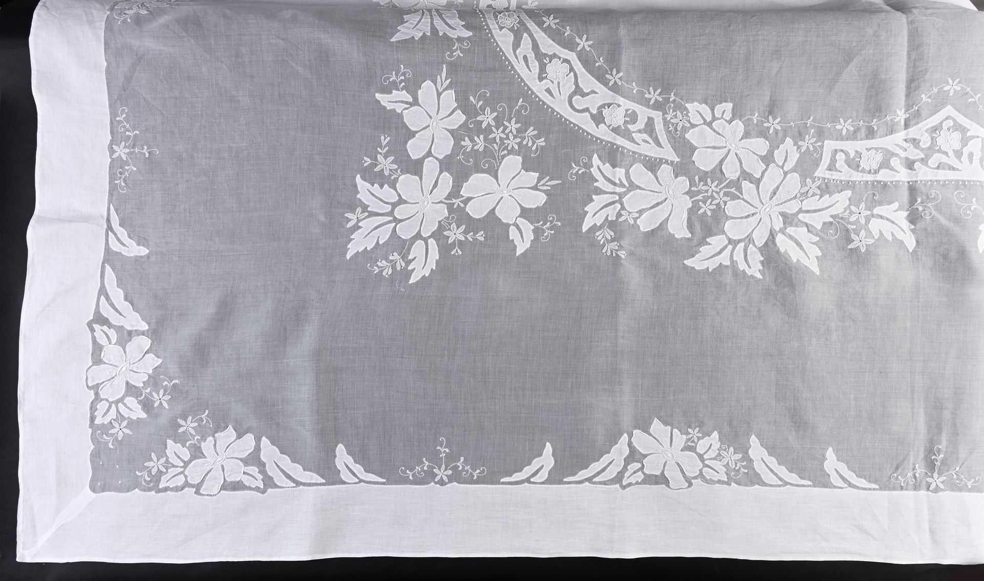 Null Tablecloth and eleven napkins, embroidered organza, mid-twentieth century.
&hellip;