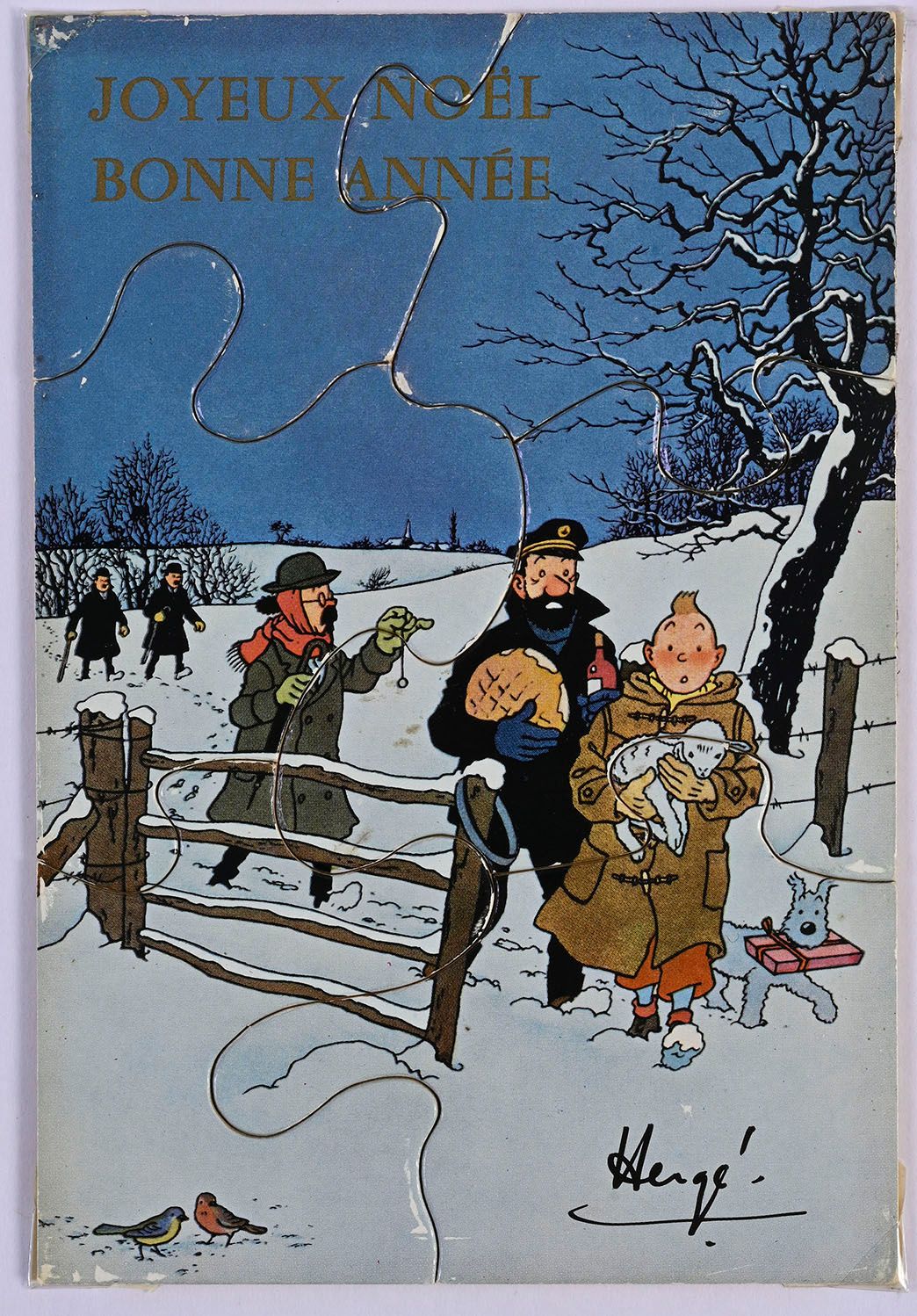 HERGE 1960/1961年贺卡。
丁丁、小雪、阿道克、向日葵和史密斯夫妇在雪地上行走。卡片采用6块拼图的形式。有赫格的墨水签名。状况良好，有些擦伤。其他图&hellip;