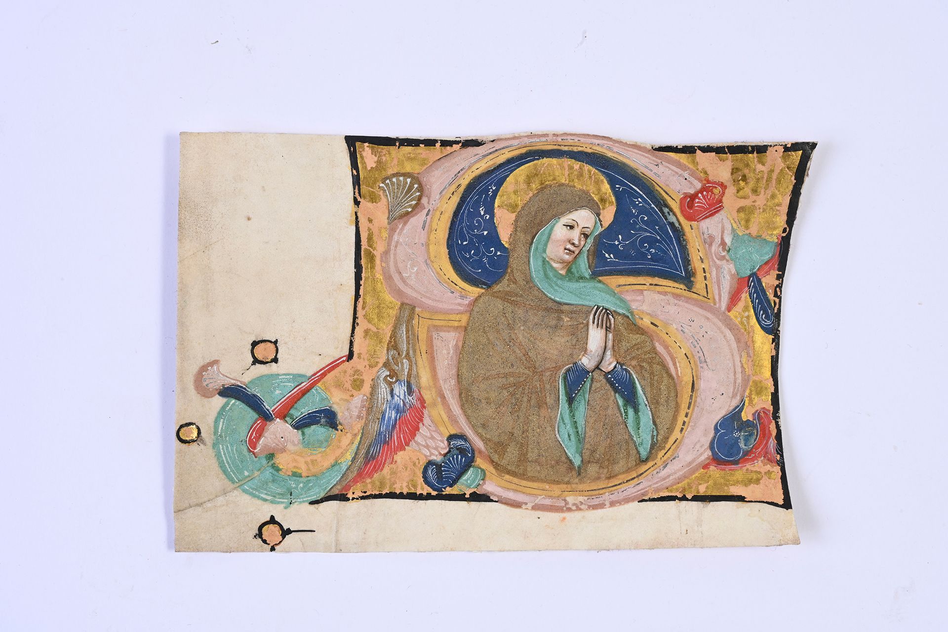 Null 牛皮纸上的彩绘，多色和镀金，首字母S是一个圣女双手合十的字母。
意大利北部，威尼斯，归功于克里斯托弗-科尔特斯（活跃于1399年至1445年）15世纪&hellip;