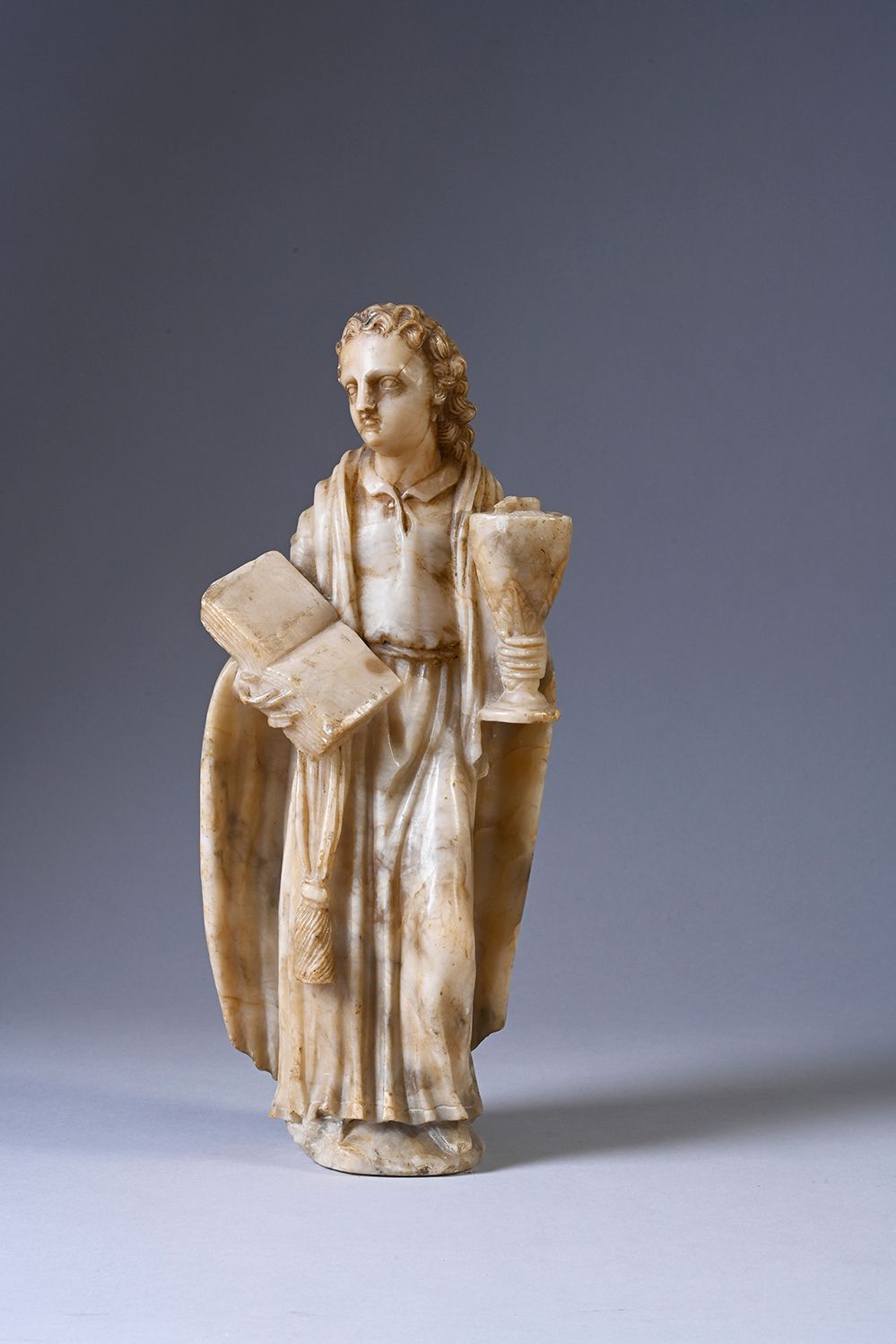 Null Saint John in sculpted alabaster. Standing, holding an open book in his rig&hellip;