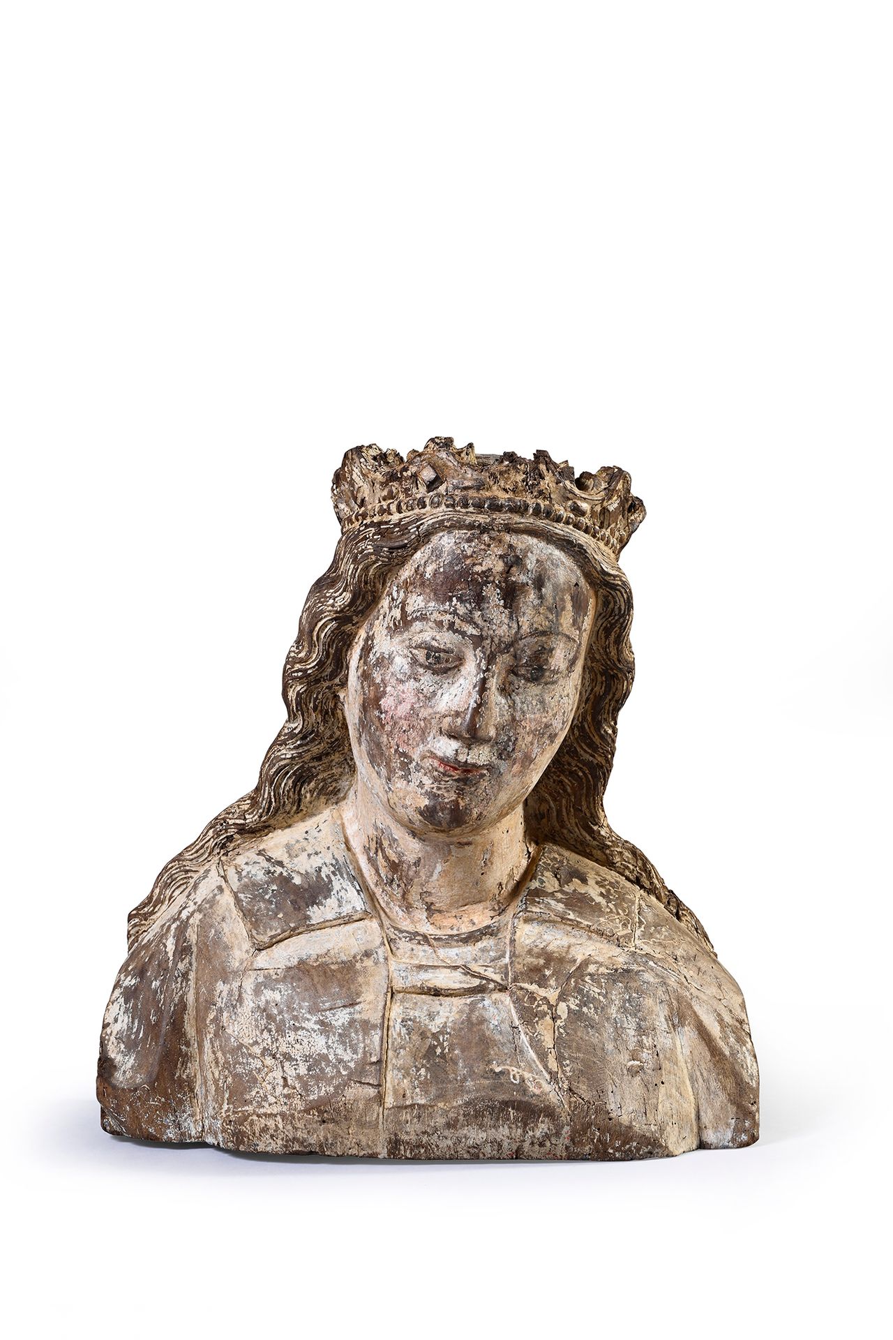Null 胡桃木雕刻的圣母玛利亚或亚历山大的圣凯瑟琳的半身像，背面镂空，有多色的遗迹；T N E下面有铭文。
14世纪
H.38厘米
(小虫孔)