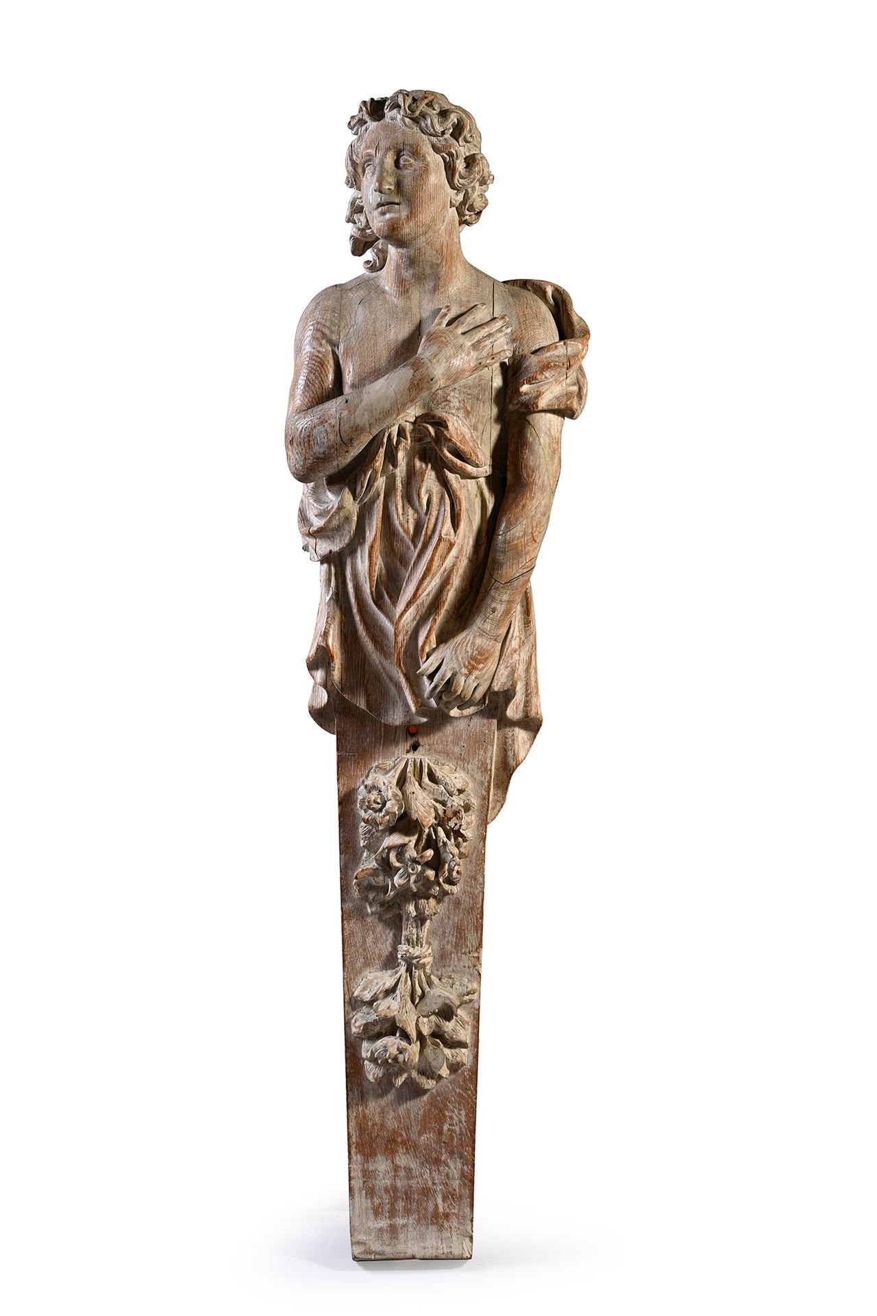 Null 橡木雕刻的卡里亚特，背部镂空，表现了一个穿鞘的男人，他的右手放在胸前，头抬起来；花落。
法国北部或佛兰德斯，17世纪
H.150厘米
(小的修复，特别&hellip;