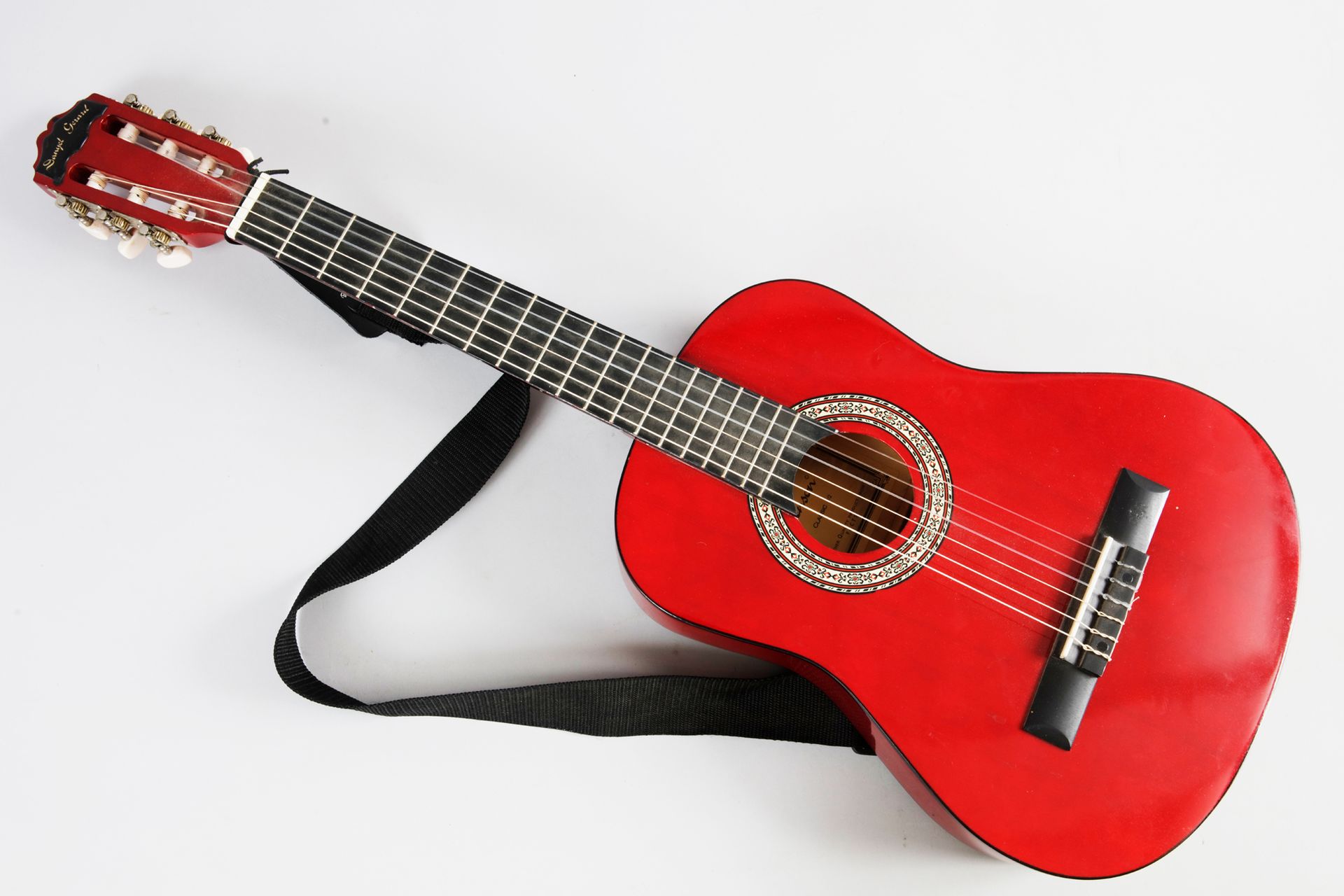 Null DANYEL GERARD (1939): A Tenson 6-string classical guitar, red in color, pur&hellip;