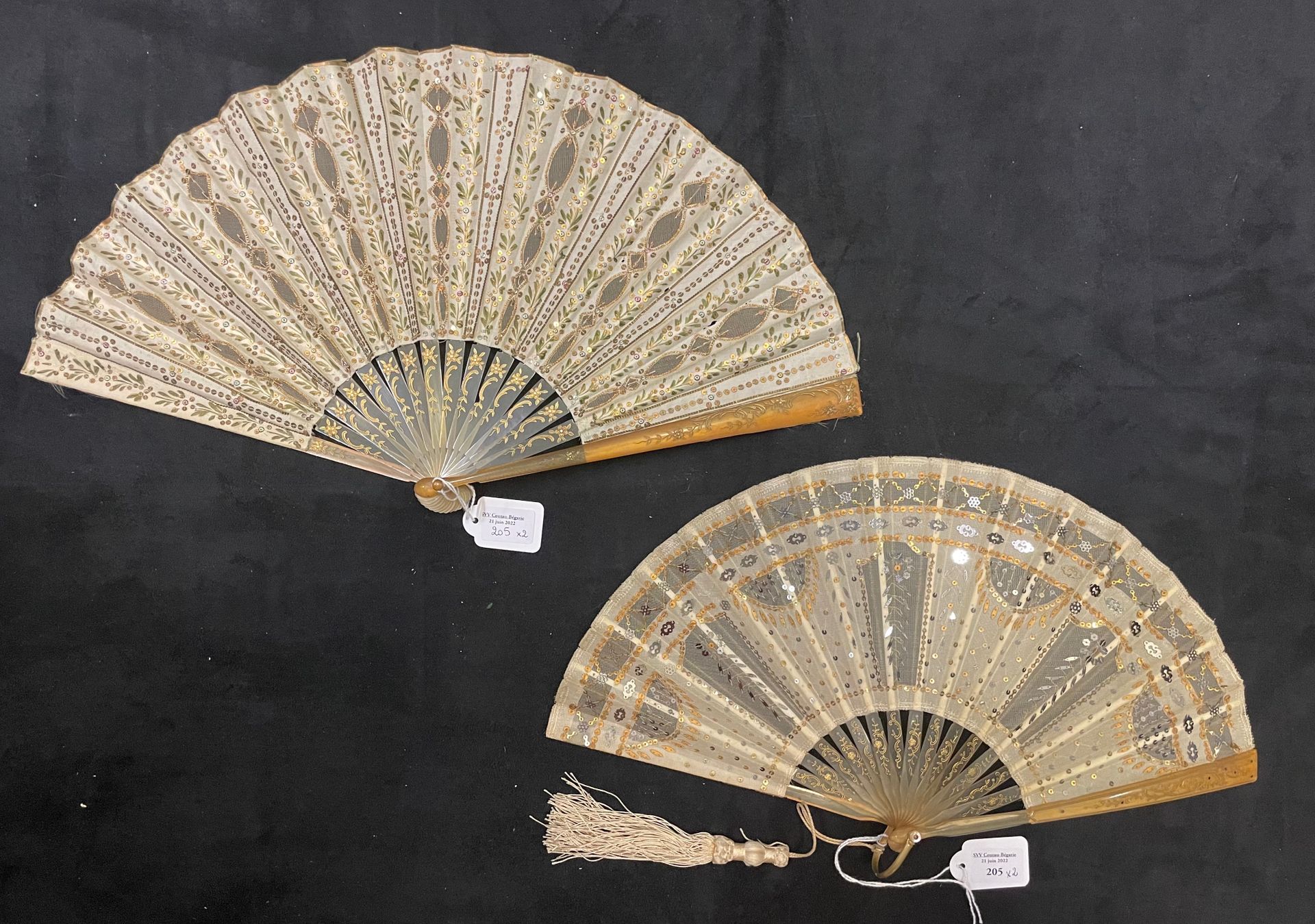 Null Sequins, Europe, circa 1900-1920 
Two fans. *One, the leaf in tulle and sil&hellip;