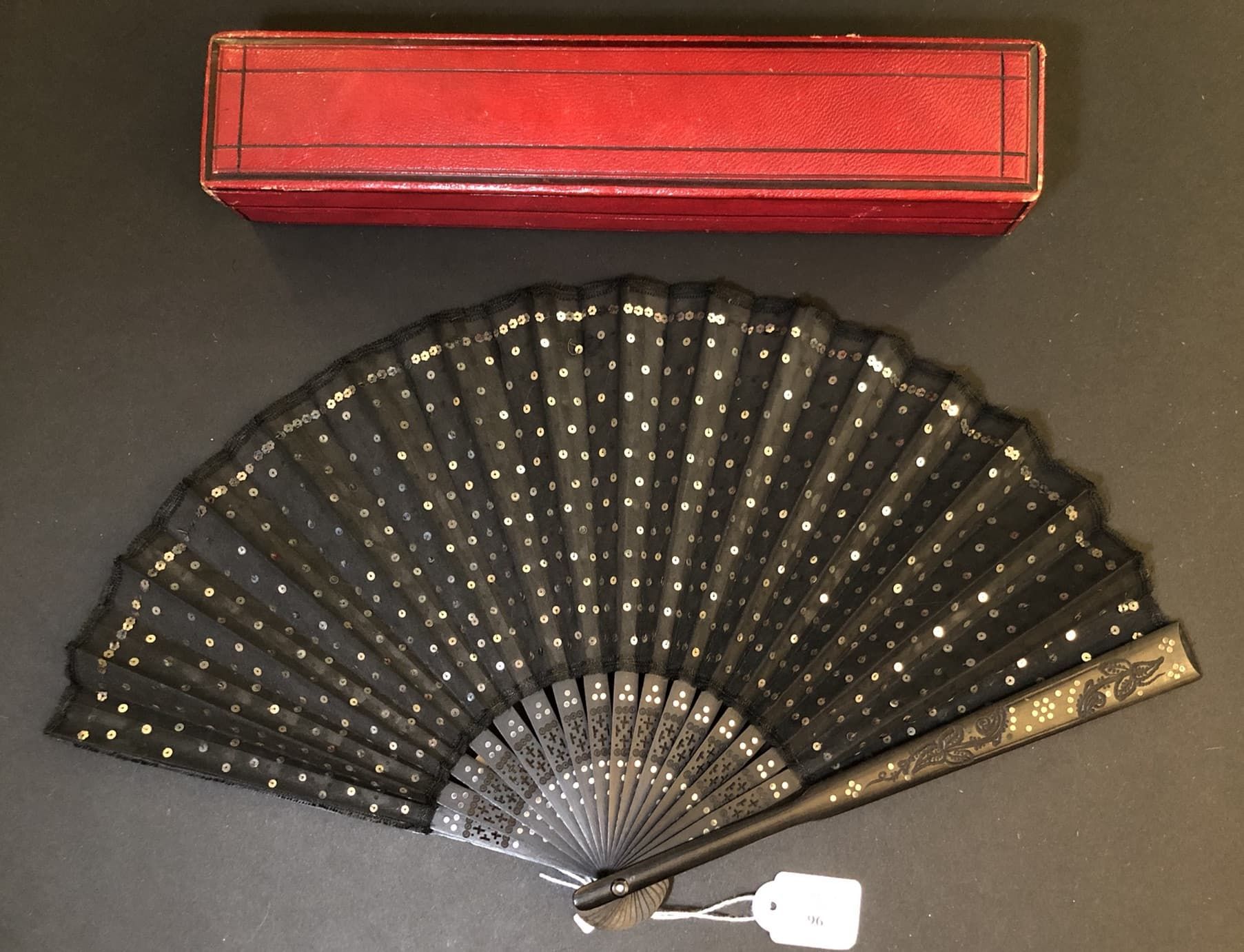 Null Sequins, Europe, circa 1900
Folded fan, the black silk leaf sewn with a plu&hellip;