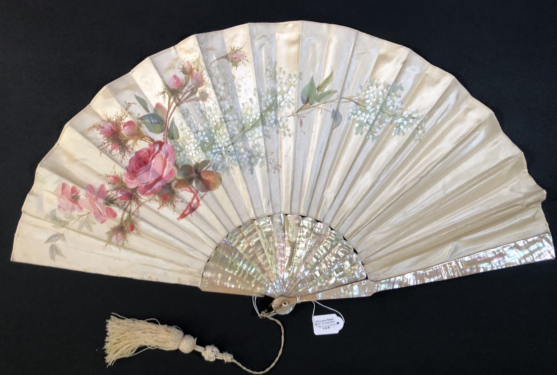 Null Roses and lilacs, Europe, ca. 1890
Folded fan, the cream satin leaf painted&hellip;