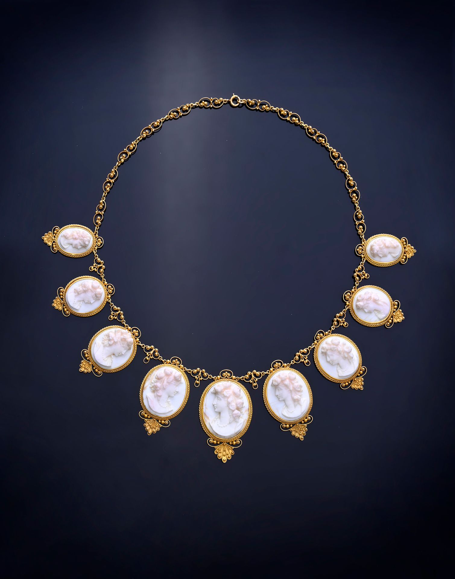Null Drapery necklace in 18k (750th) gold, set with 9 cameos on angel-skin coral&hellip;