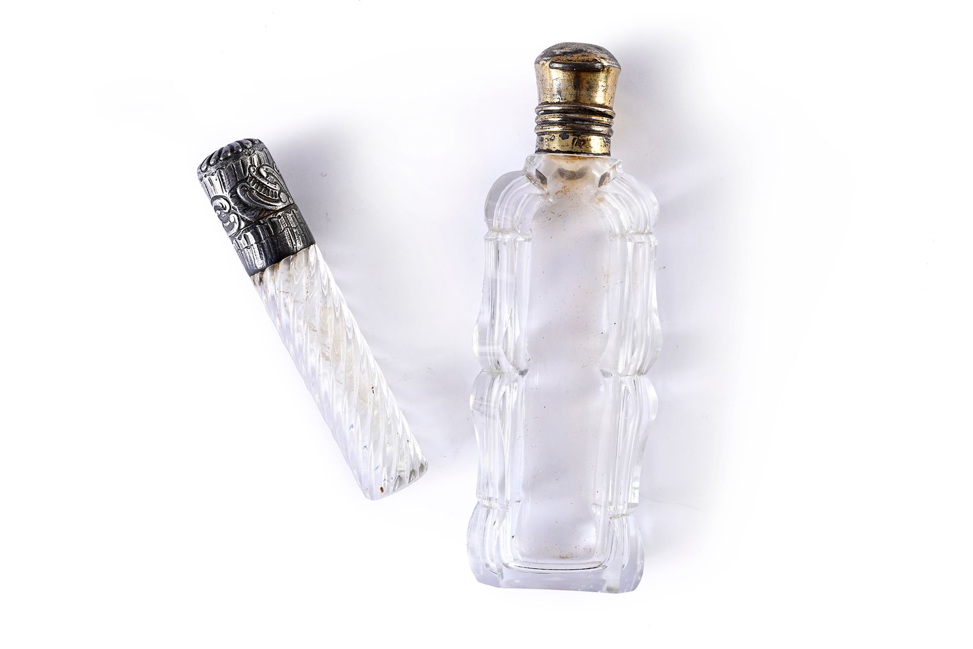 Null Two cut-glass salt flasks, one with a silver stopper decorated with scrolls&hellip;