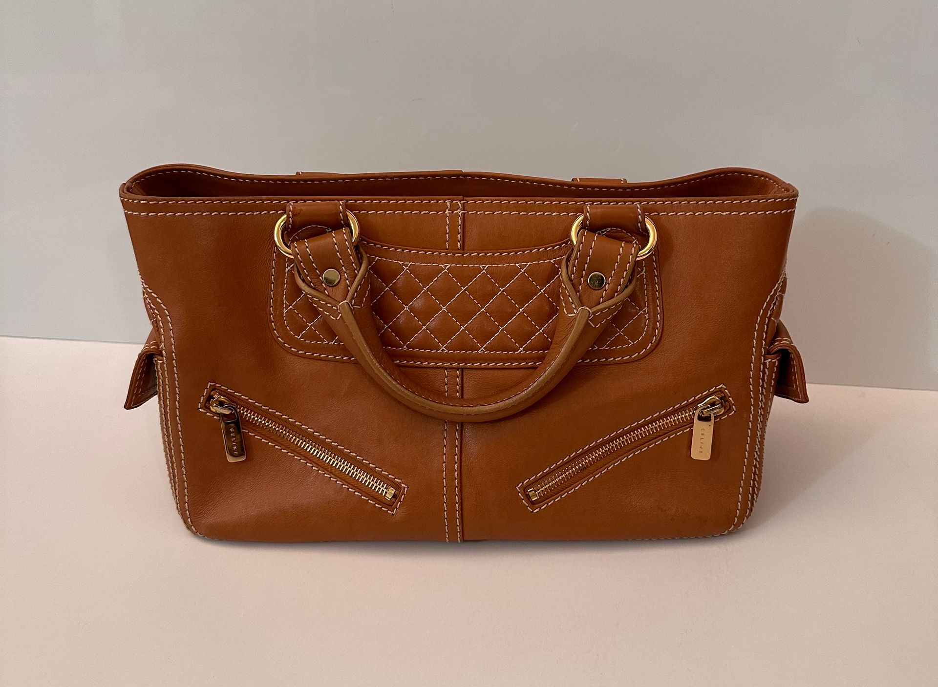 Null CELINE, smooth camel leather "Boogie" handbag designed by Michael Kors. One&hellip;