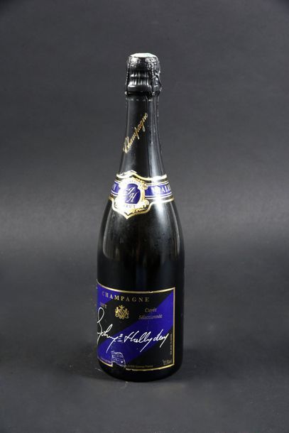Null 1983. Bouteille de champagne «Johnny Hallyday»
Col et muselet intacts. Offe&hellip;
