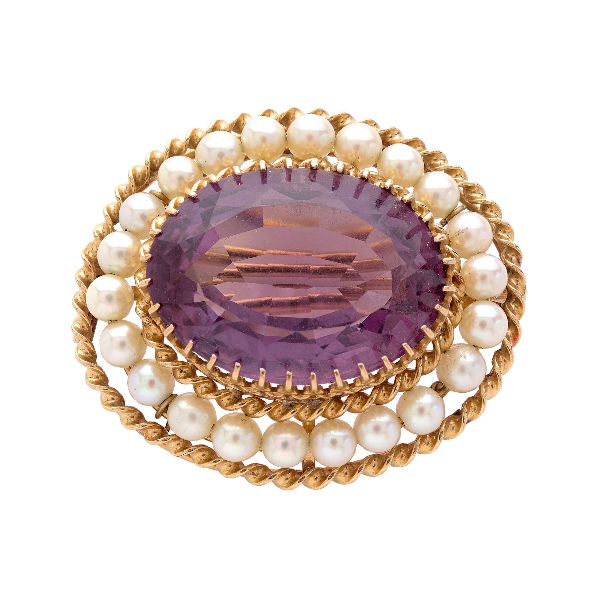 Null 古老的手镯

光滑的黄金，镶嵌着一个椭圆形的紫水晶，周围是小珍珠。

一枚紫水晶、珍珠和18K金胸针。



RC :

尺寸：4 x 3厘米左右。
&hellip;