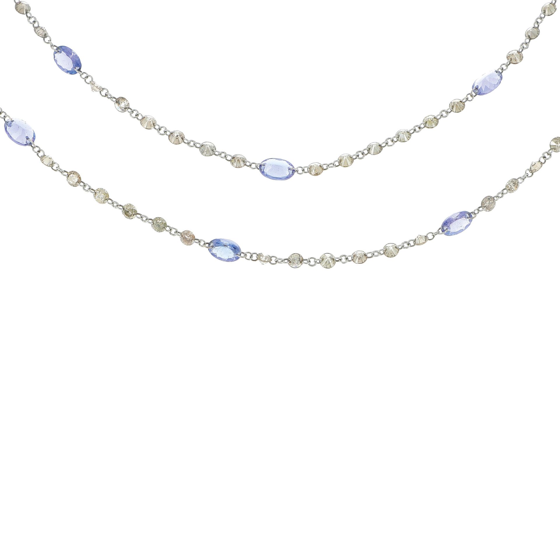 Null SAUTOIR

A white gold chain, punctuated with faceted diamonds and oval tanz&hellip;